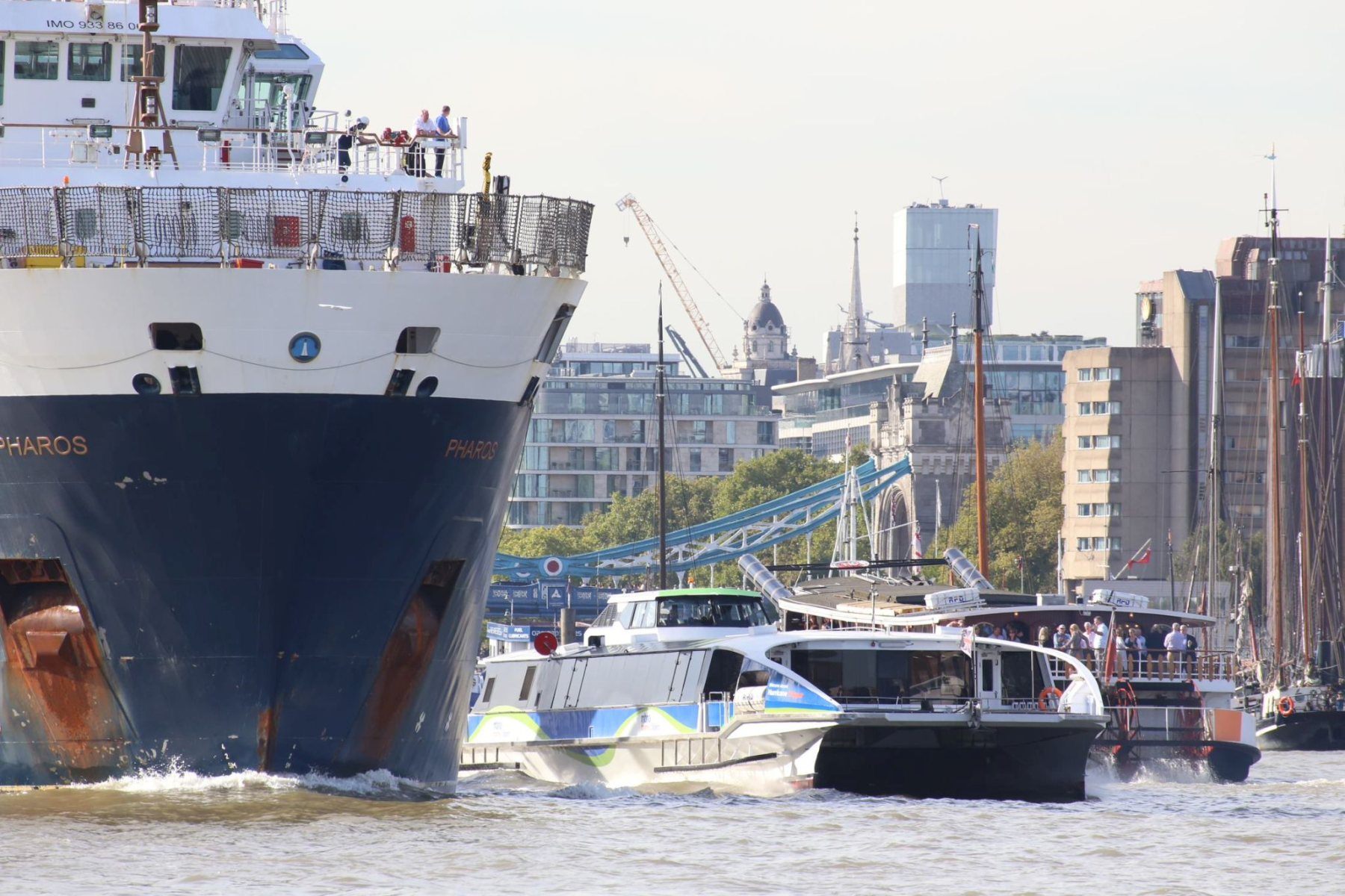 Ship NLV Pharos visiting River Thames, London 14-Sep-2019.  Next to a Thames Clipper fast ferry