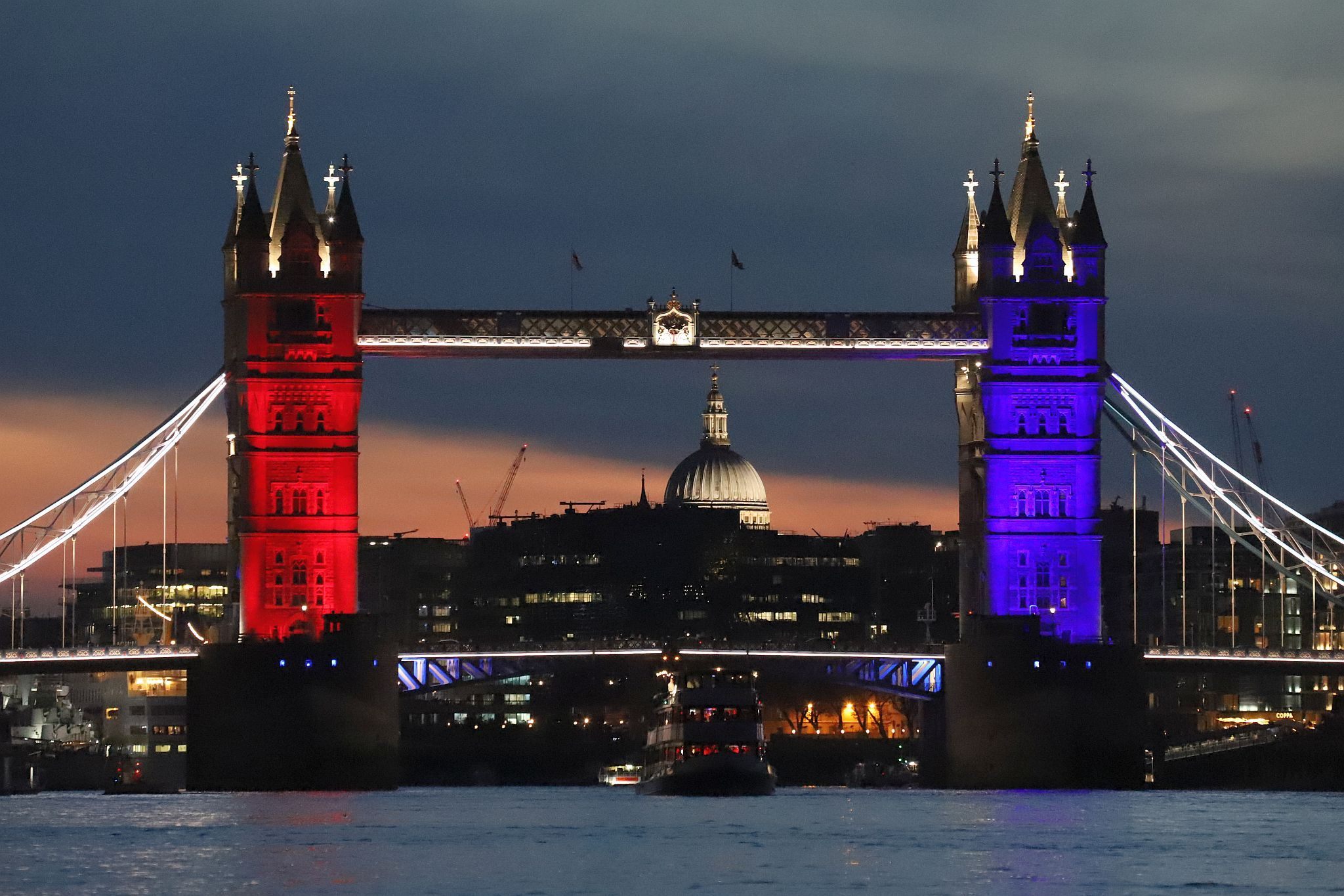 Tower Bridge lit red, white and blue to mark the Coronation of King Charles III and Queen Camilla. Photo taken 07-May-2023. London.