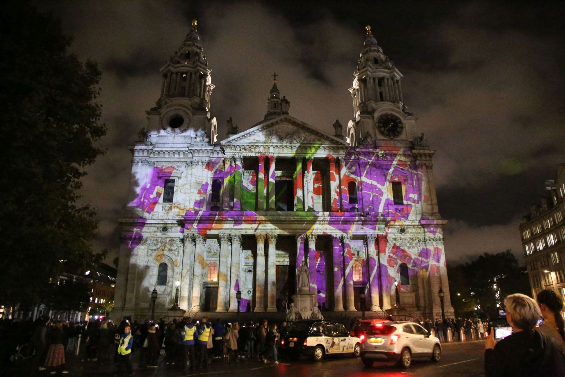 2019 St. Paul's Cathedral Illuminated with projected photos to remember the work of the St. Paul’s Fire Watch who protected the cathedral through the bombing and fires of The Blitz in World War Two