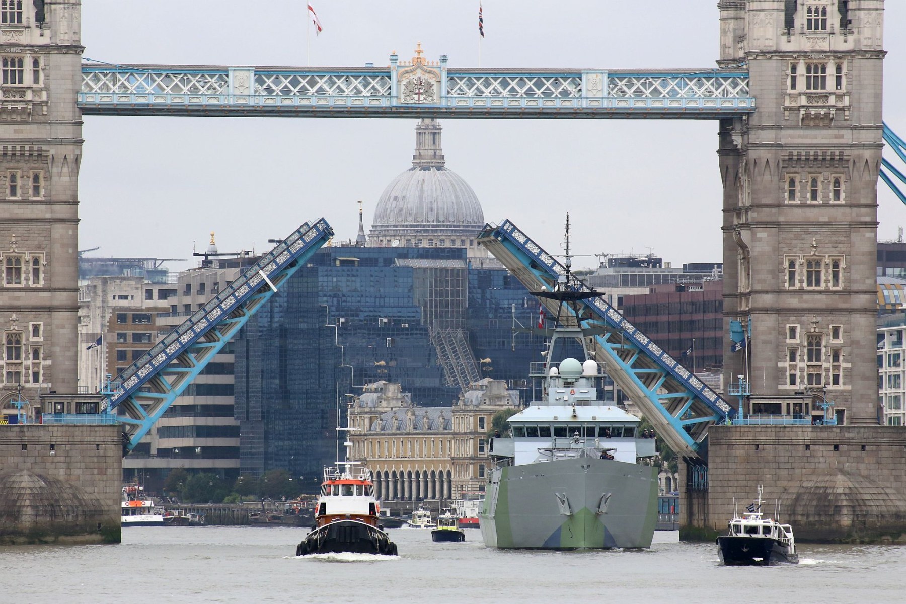 Royal Navy P282 HMS Severn leaving London sailing down the River Thames in Western Approaches camouflage on  11-Sep-2021, Tower Bridge in background