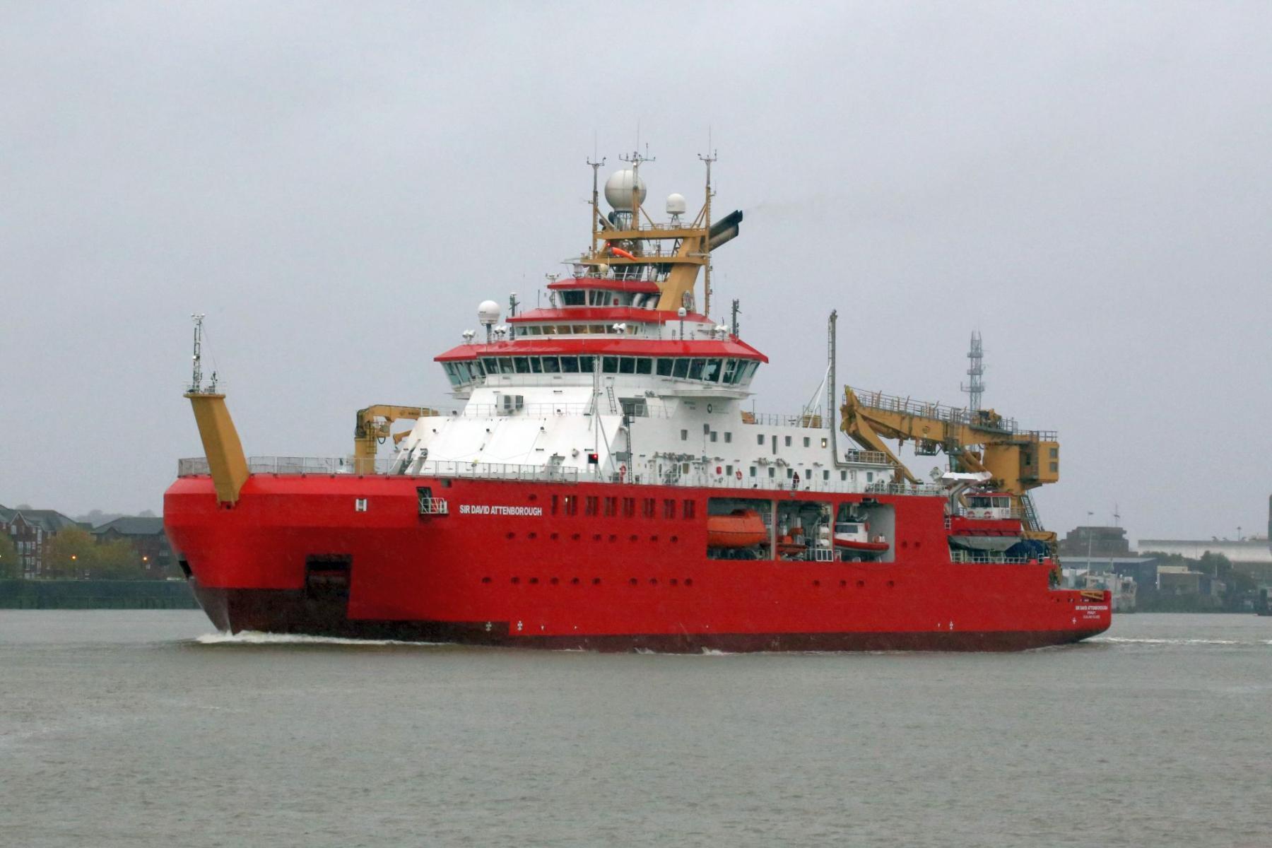 RRS Sir David Attenborough passing Woolwich, London on the River Thames heading out to sea.