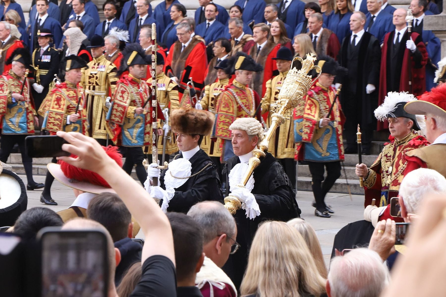Crowds watch the Lord Mayor and dignitaries at the reading of the Royal Proclamation of King Charles III as King, read from the steps of the Royal Exchange in the City of London.