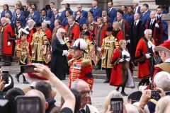 Crowds watch the Lord Mayor and dignitaries at the reading of the Royal Proclamation of King Charles III as King, read from the steps of the Royal Exchange in the City of London.