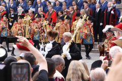 Crowds watch the Lord Mayor and dignitaries at the reading of the Royal Proclamation of King Charles III as King, read from the steps of the Royal Exchange in the City of London.