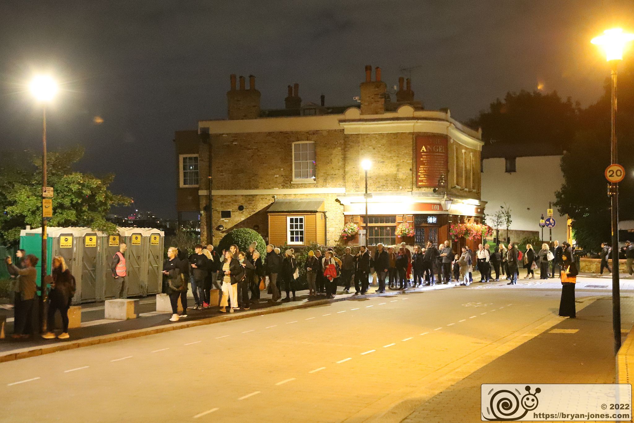 The queue at The Angel pub, Bermondsey Wall East in the night