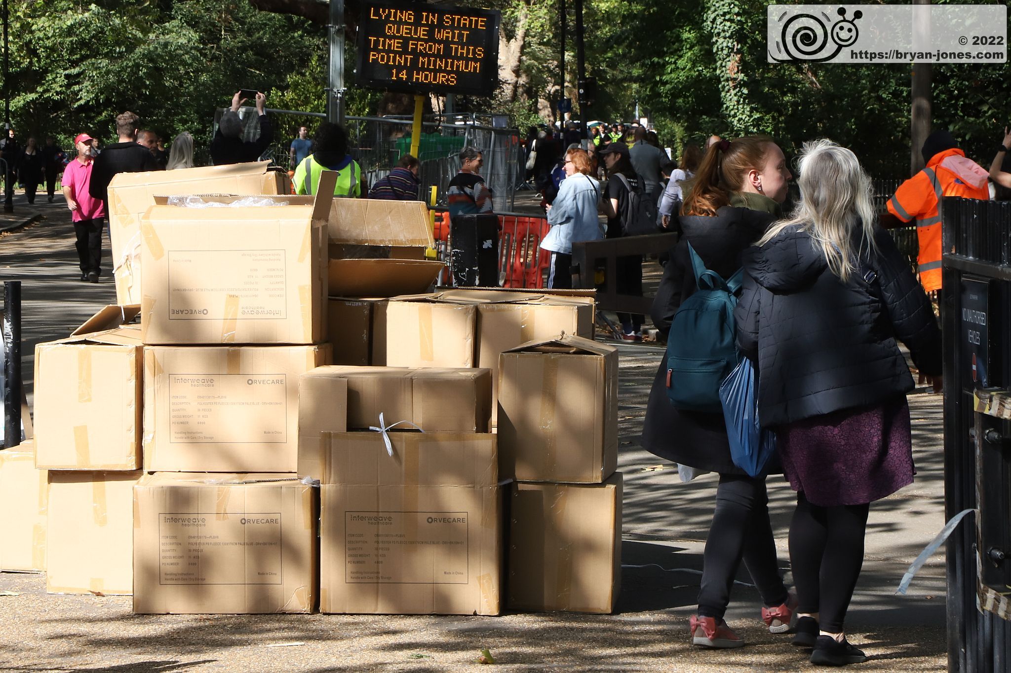 Boxes of fleece blankets in Southwark Park for queue joiners