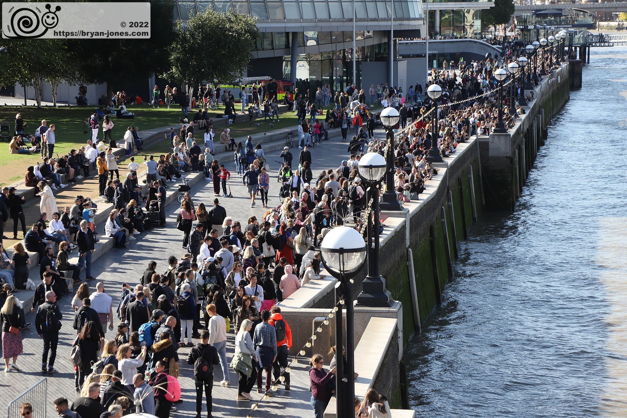 The queue passes Potters Fields and City Hall. From Tower Bridge