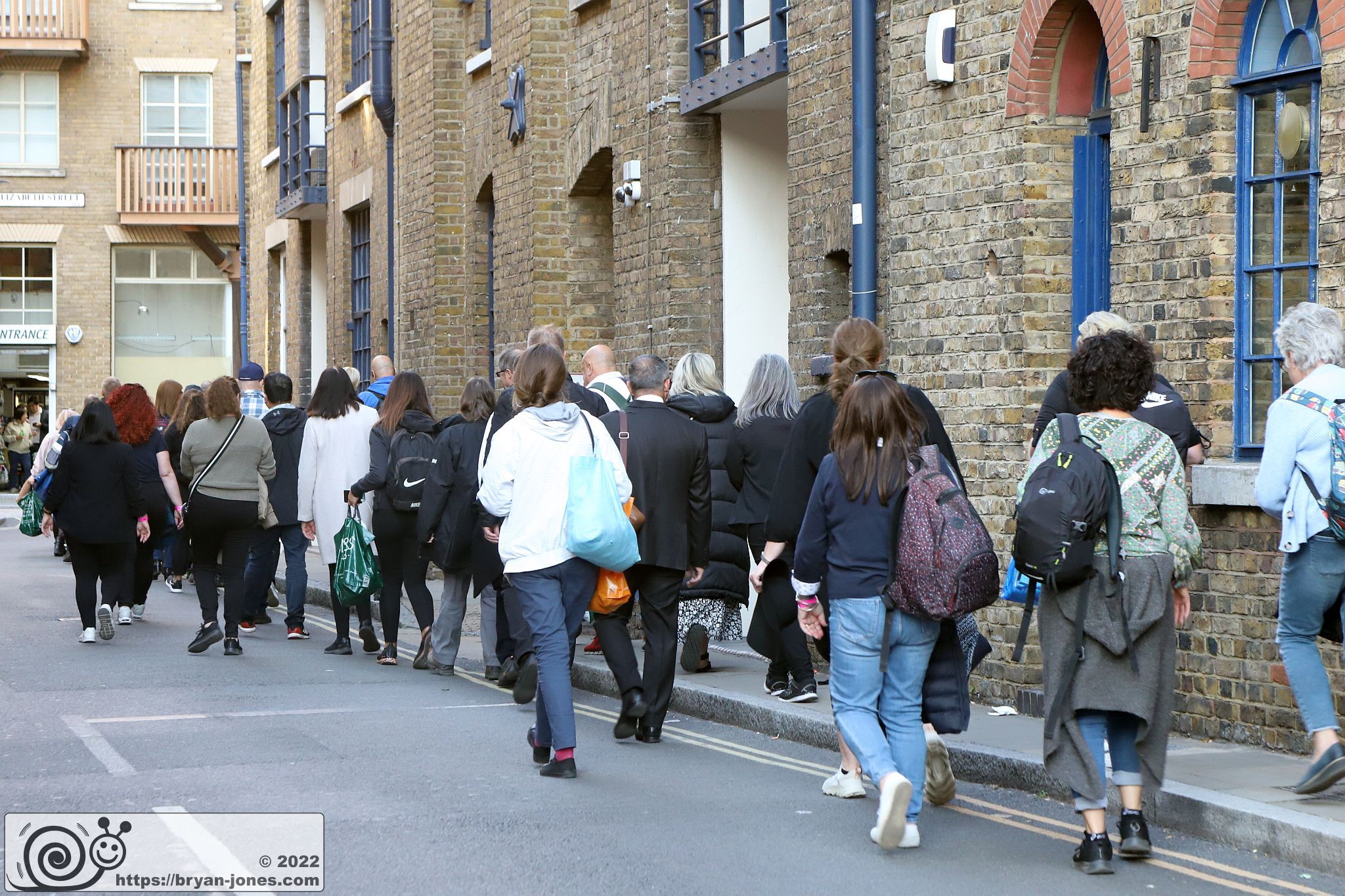 The lying-in-state queue entering Shad Thames from Jamaica Road