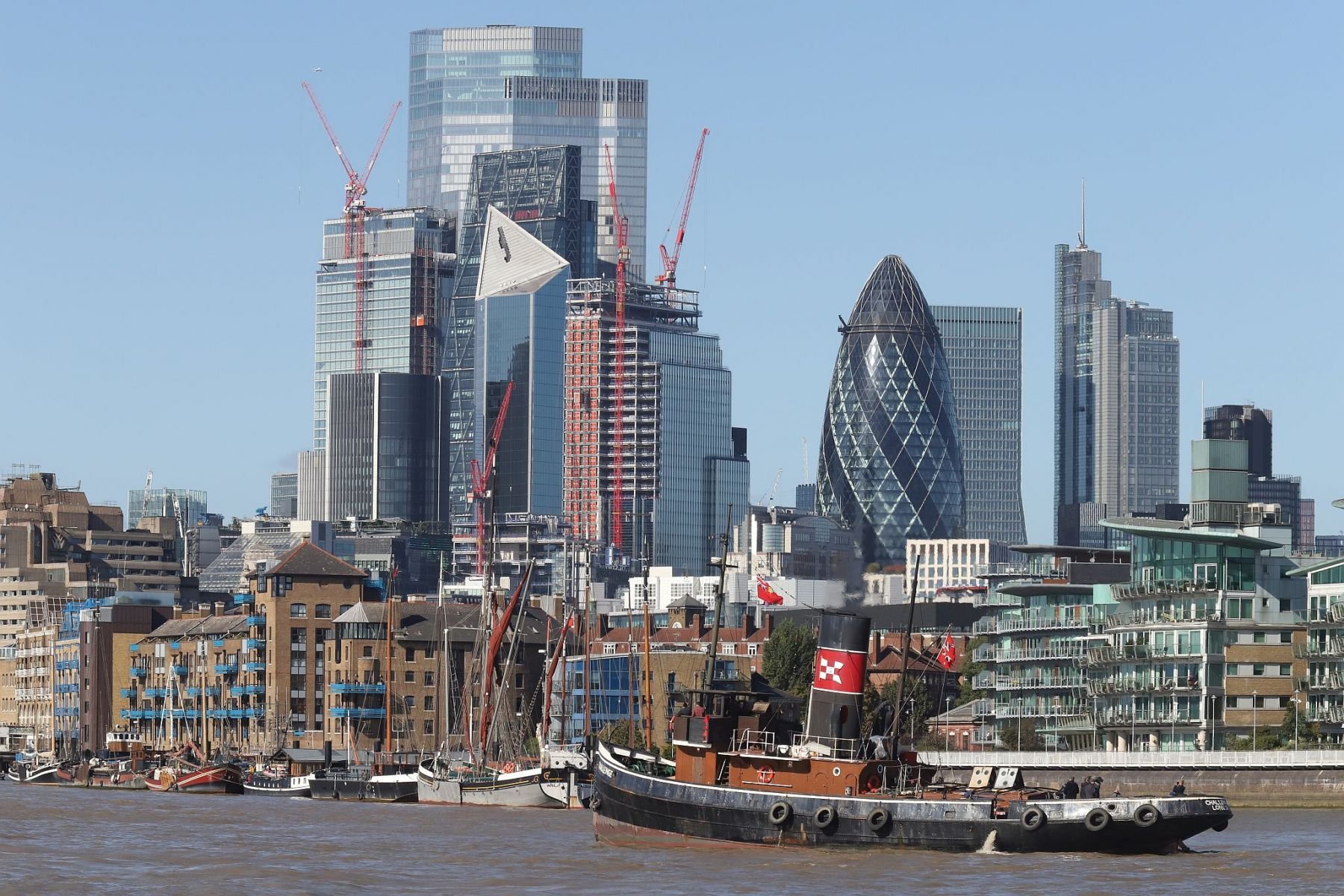 Steam Tug Challenge with the City of London in the background in 2022
