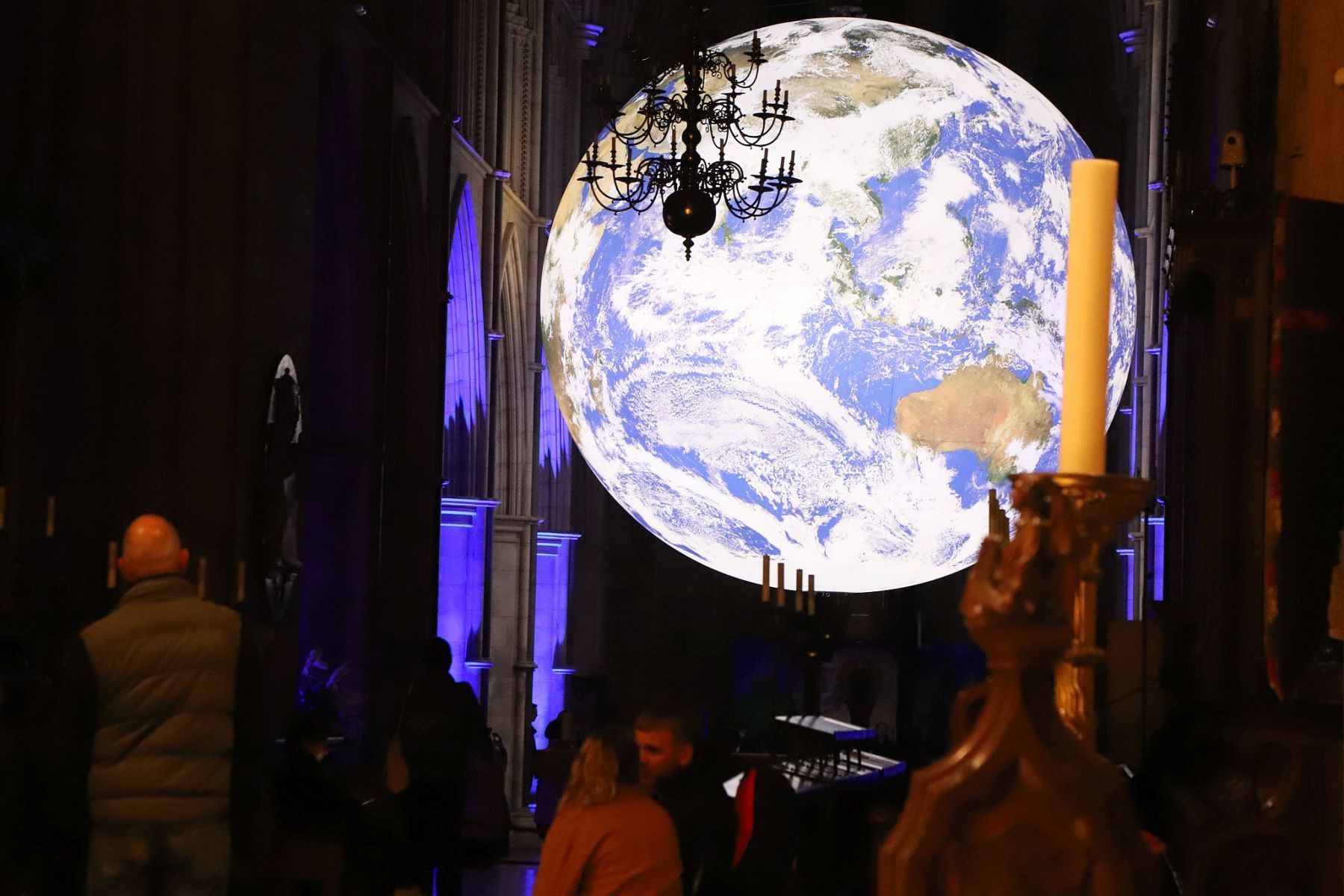 Gaia Earth by Luke Jerram at Southwark Cathedral in October 2022, seen at night
