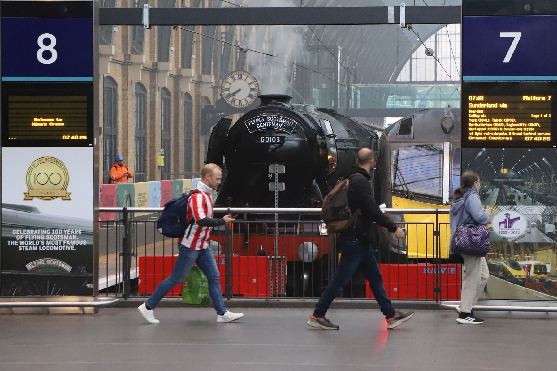 Flying Scotsman steam locomotive at King's Cross railway station platform 8 for the 170th anniversary of the station's opening and the start of Flying Scotsman's 100th birthday celebrations