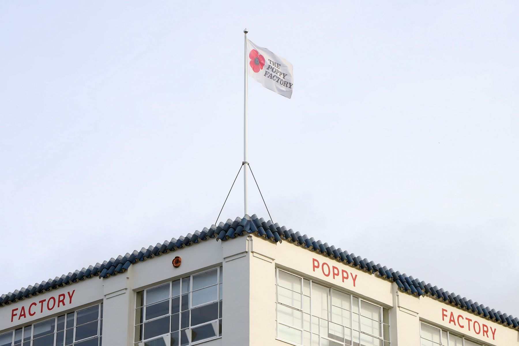 The flag flying over the Poppy Factory in Richmond, SW London