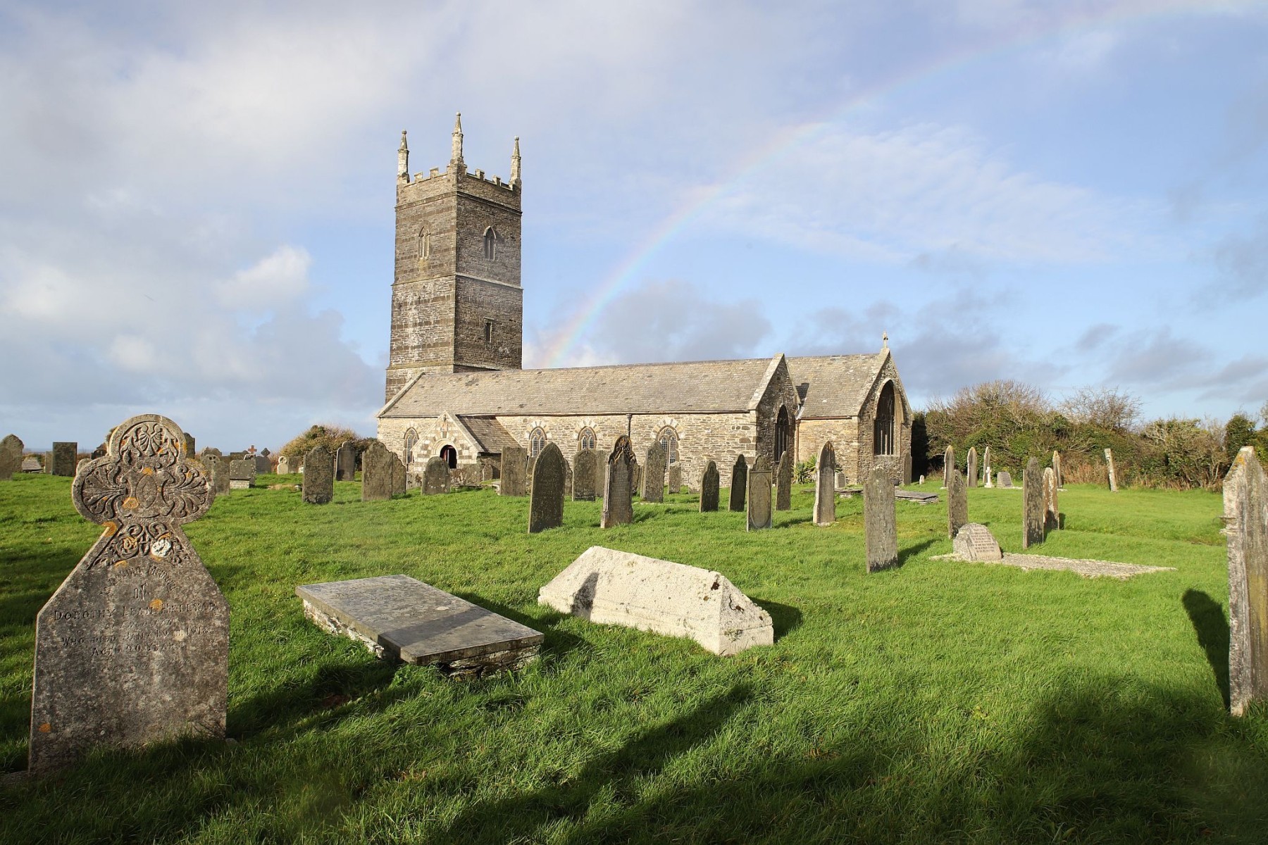Rainbow over St. Eval Parish Church near Newquay in Cornwall