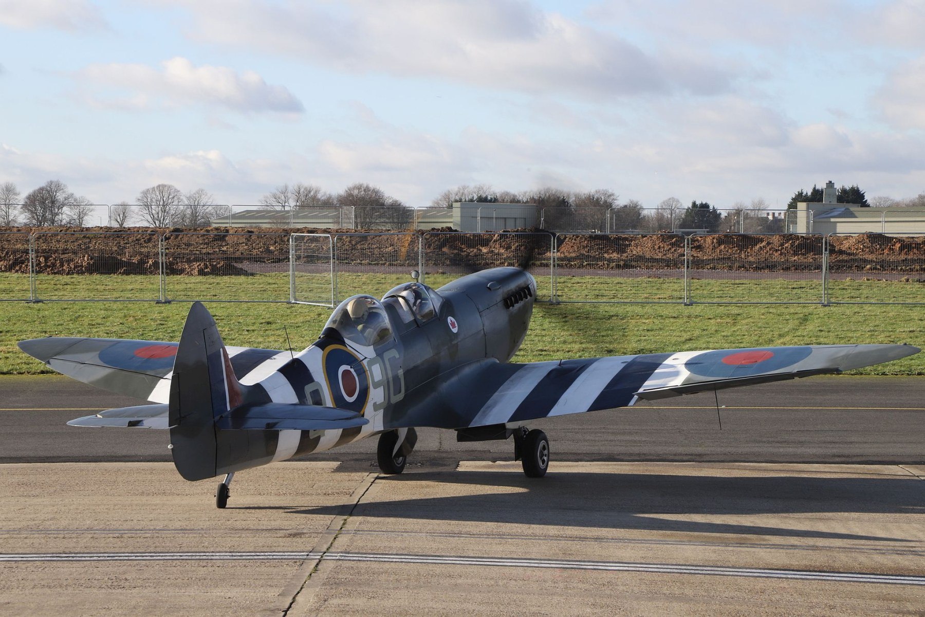 Spitfire taxing out for take off from the former RAF Biggin Hill. Biggin Hill Spitfire Factory two seat Spitfire T.9 MJ627.