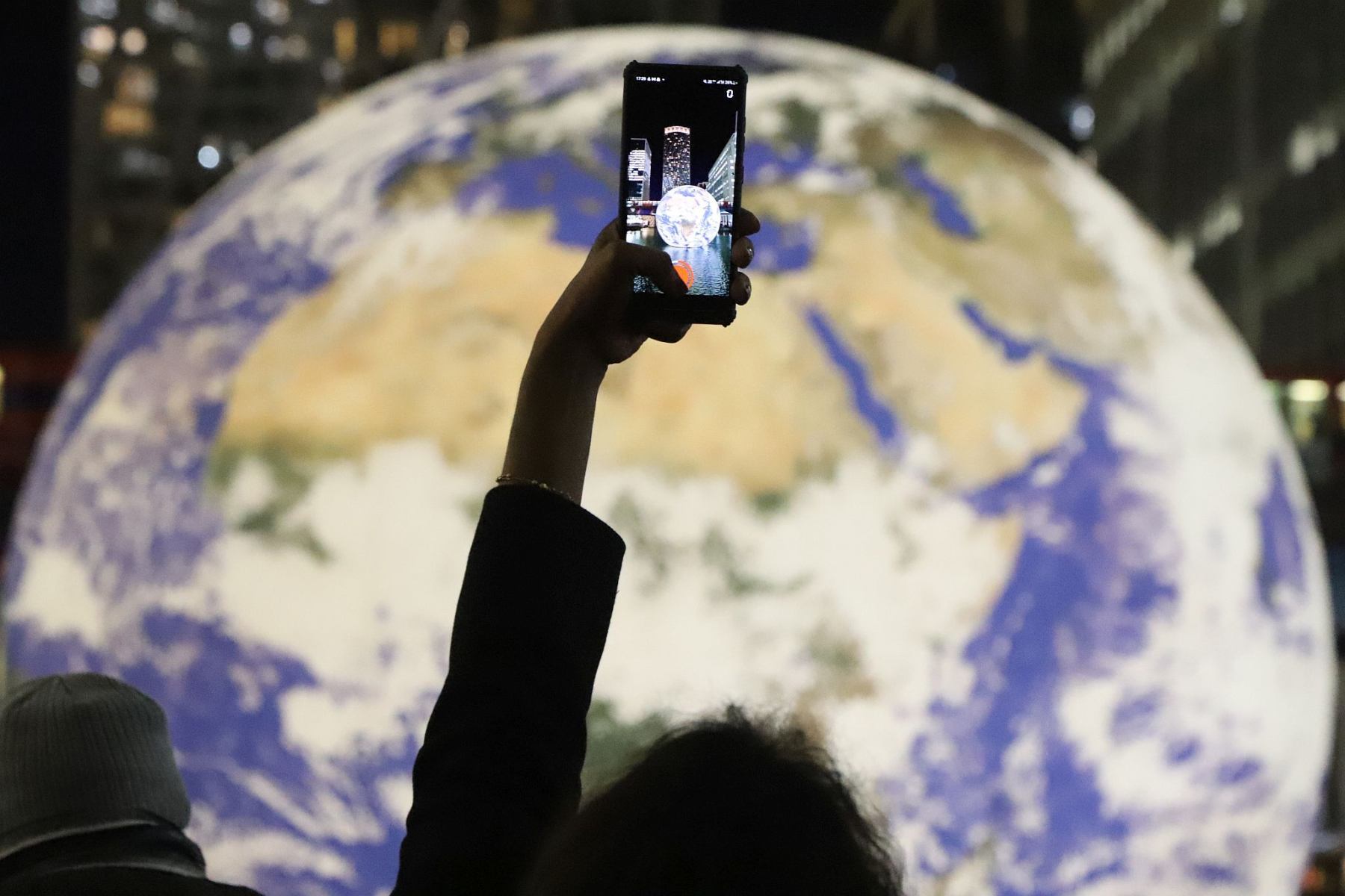 Floating Earth by Luke Jerram at Canary Wharf, London, 19-Jan-2023