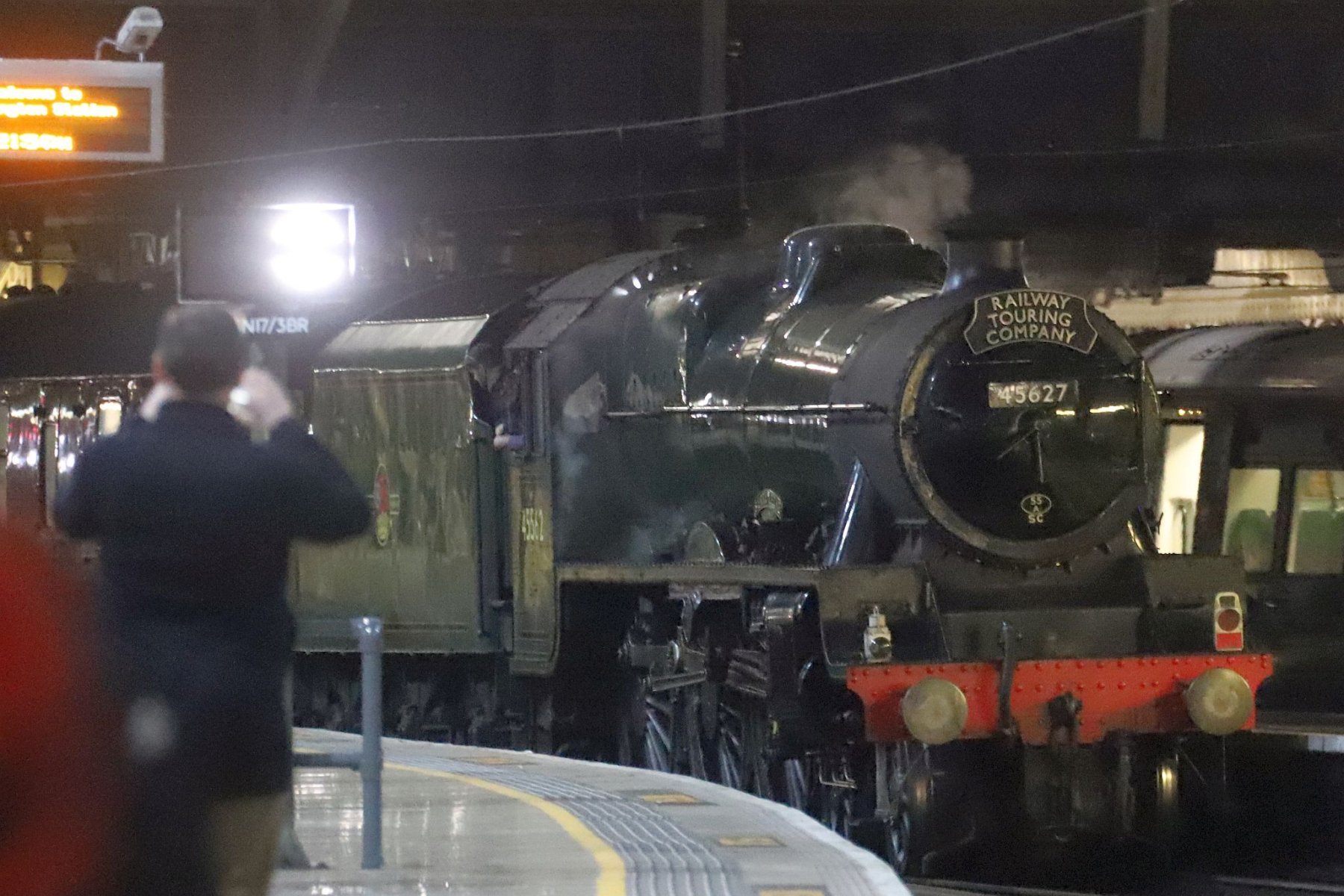 LMS Jubilee Class 5699/45699 Galatea at London Paddington railway station on the evening of 18-Feb-2023 with the Railway Touring Company's special train The Cotswold Venturer. Running as 45627 "Sierra Leone" with 45562 painted on the cab side.