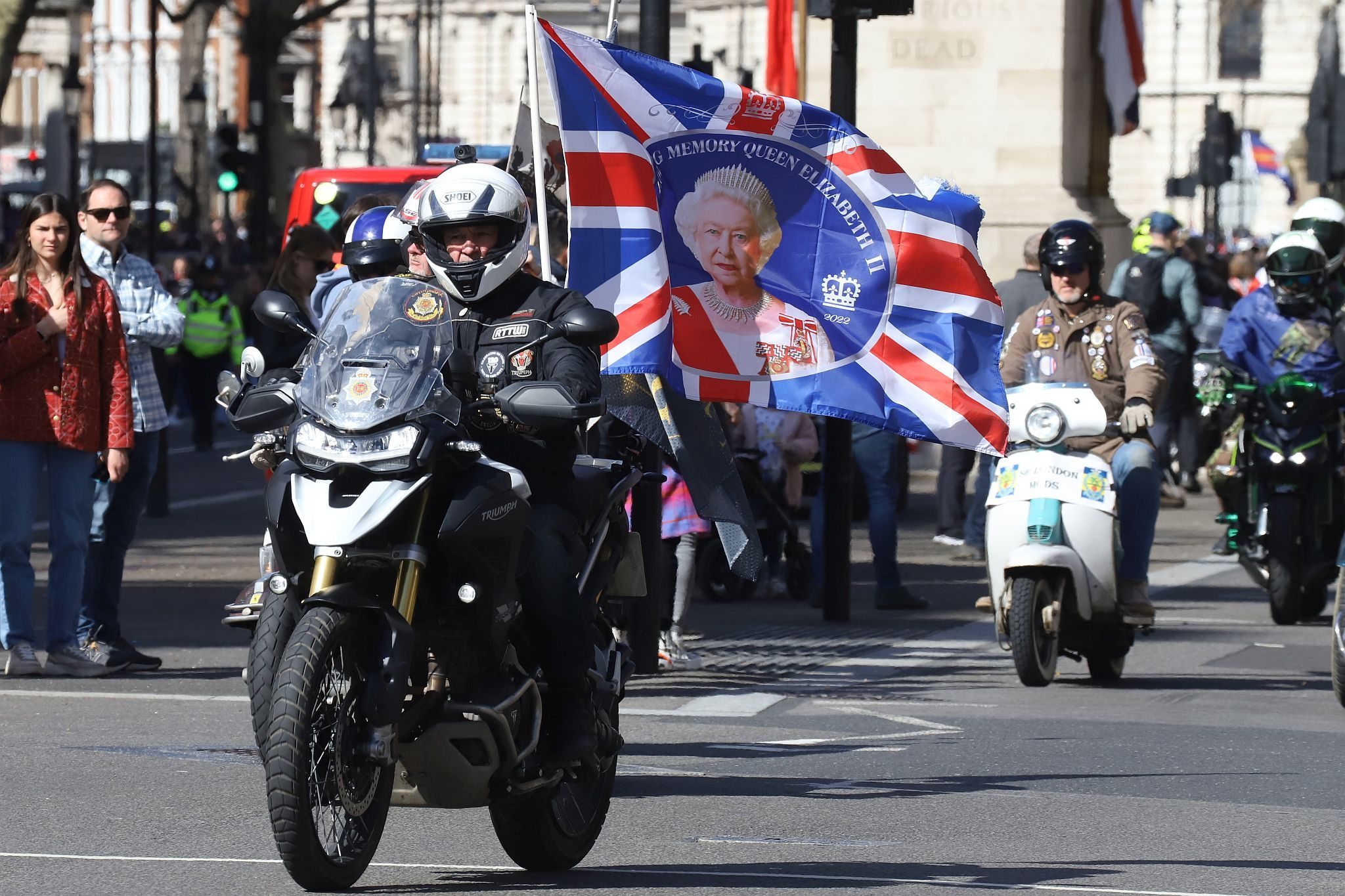 The Rolling Thunder UK military veterans motorcycle Ride of Respect, in memory of the late HM Queen Elizabeth II. 7th April 2023, Good Friday. Photographed in Whitehall, Westminster, London passing The Cenotaph war memorial and 10 Downing Street. Armed forces veterans. Union Flag. Union Jack.