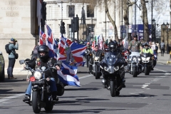 The Rolling Thunder UK military veterans motorcycle Ride of Respect, in memory of the late HM Queen Elizabeth II. 7th April 2023, Good Friday. Photographed in Whitehall, Westminster, London passing The Cenotaph war memorial and 10 Downing Street. Armed forces veterans. Union Flag. Union Jack.