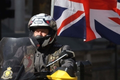 The Rolling Thunder UK military veterans motorcycle Ride of Respect, in memory of the late HM Queen Elizabeth II. 7th April 2023, Good Friday. Photographed in Whitehall, Westminster, London passing The Cenotaph war memorial and 10 Downing Street. Armed forces veterans. Union Flag. Union Jack.