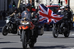 The Rolling Thunder UK military veterans motorcycle Ride of Respect, in memory of the late HM Queen Elizabeth II. 7th April 2023, Good Friday. Photographed in Whitehall, Westminster, London passing The Cenotaph war memorial and 10 Downing Street. Armed forces veterans. Union Flag. Union Jack.