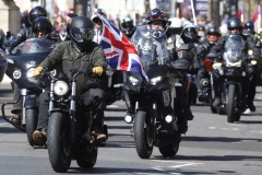 The Rolling Thunder UK military veterans motorcycle Ride of Respect, in memory of the late HM Queen Elizabeth II. 7th April 2023, Good Friday. Photographed in Whitehall, Westminster, London passing The Cenotaph war memorial and 10 Downing Street. Armed forces veterans. Union Flag. Union Jack.