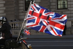 The Rolling Thunder UK military veterans motorcycle Ride of Respect, in memory of the late HM Queen Elizabeth II. 7th April 2023, Good Friday. Photographed in Whitehall, Westminster, London passing The Cenotaph war memorial and 10 Downing Street. Armed forces veterans. Union Flag. Union Jack.