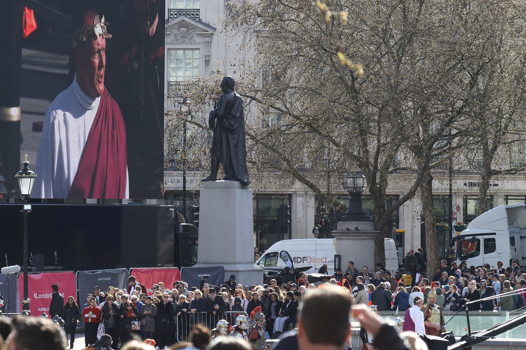 The Good Friday Wintershall Easter Passion Play "The Passion of Jesus" presented at Trafalgar Square in London. 7th April 2023. The big screen on which the play was shown to the audience.