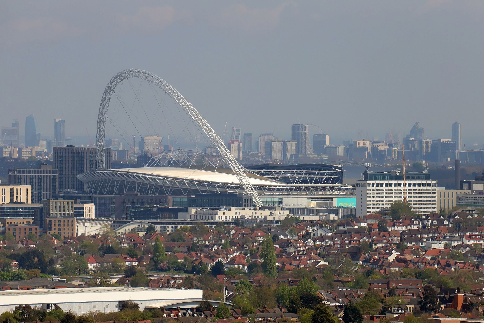 The view of Wembley Stadium seen from the tower. St Mary’s Church, Harrow-on-the-Hill, London. 29-Apr-2023.