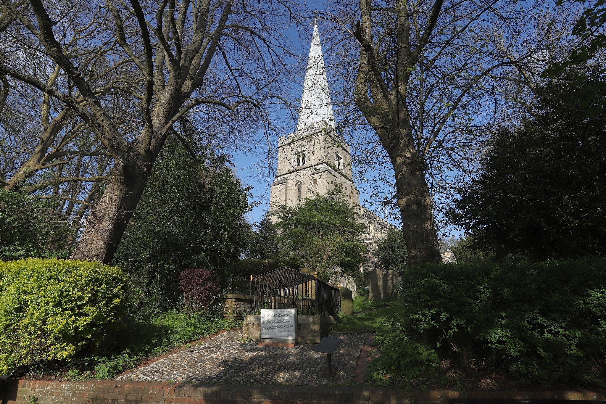 The church seen through the trees. St Mary’s Church, Harrow-on-the-Hill, London. 29-Apr-2023.