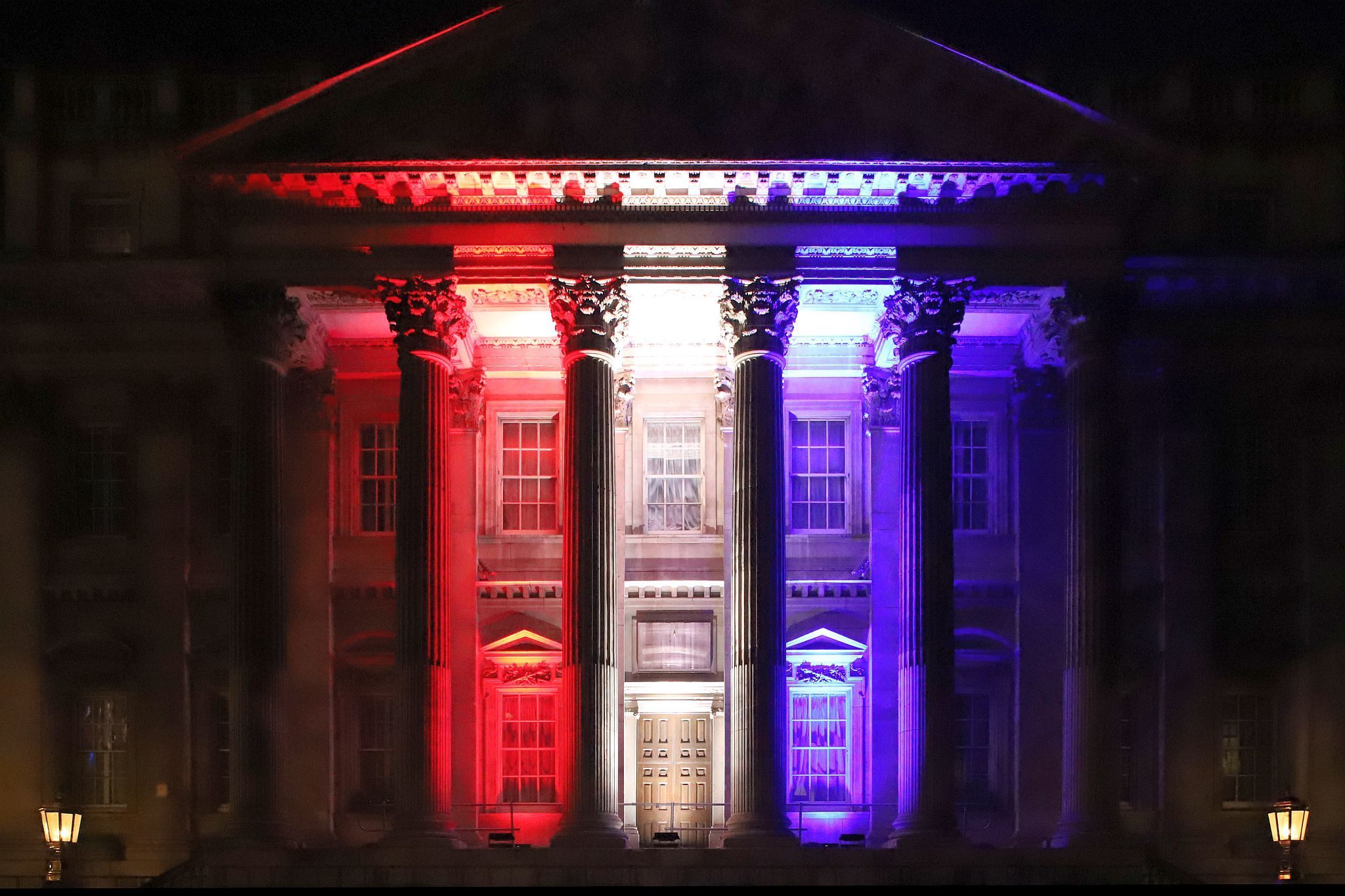 The Mansion House lit red, white and blue to mark the Coronation of King Charles III and Queen Camilla. Photo taken 07-May-2023. London.