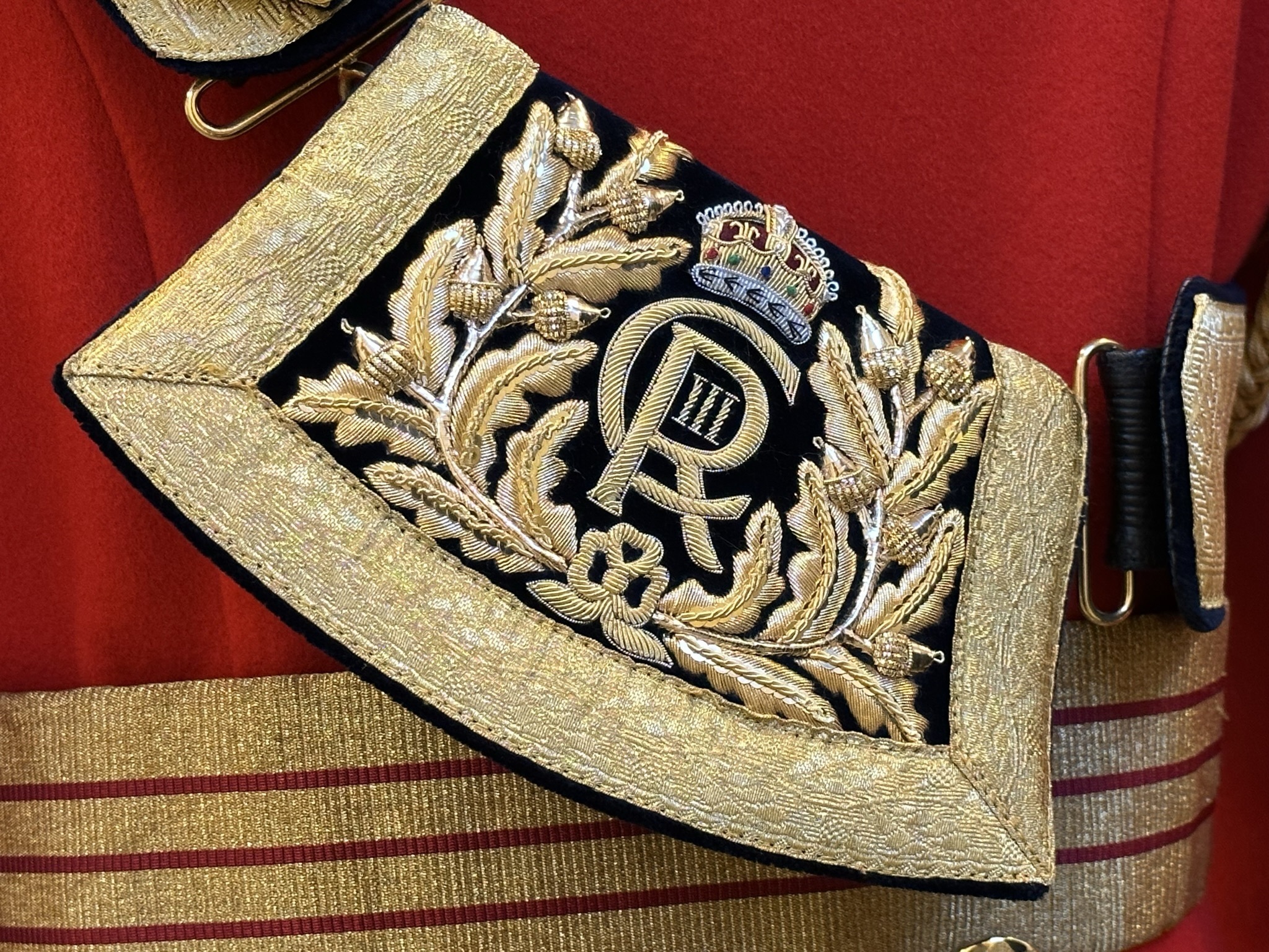 Pouch featuring the Royal Cipher of King Charles III. CRIII. CR3.  Gentlemen at Arms ceremonial uniform, the ceremonial bodyguard of King Charles III, which was founded by King Henry VIII in 1509. 13-May-2023.