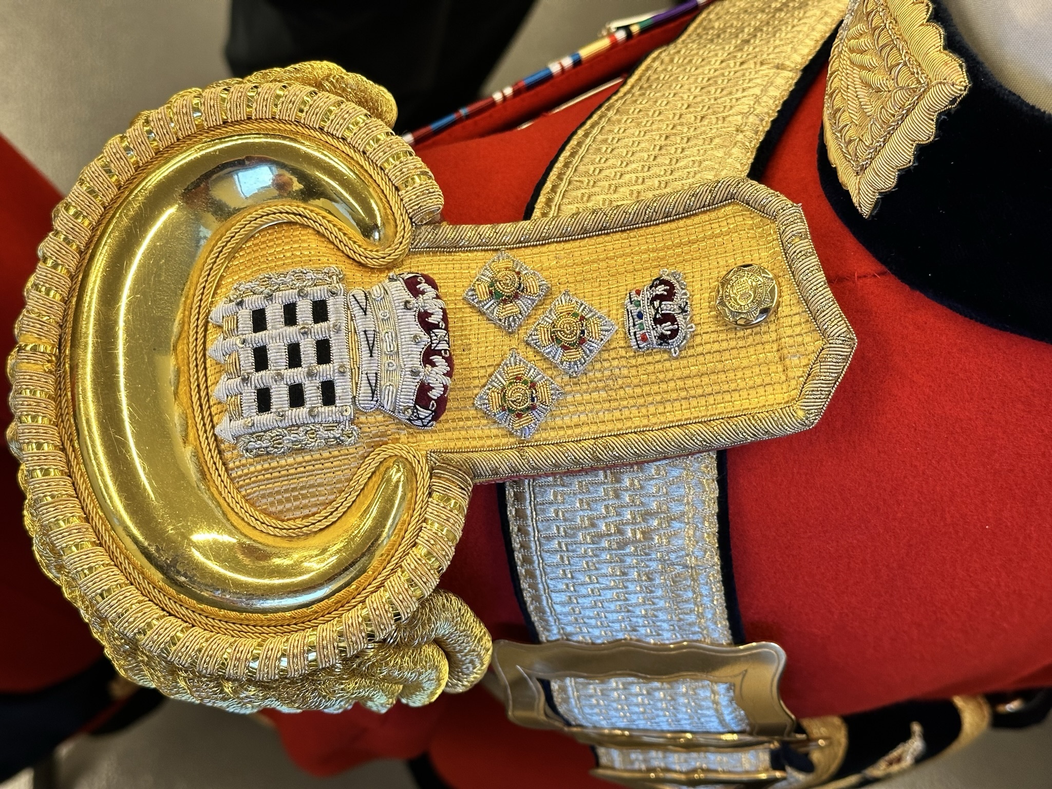 Embroidered epaulettes. Gentlemen at Arms ceremonial uniform, the ceremonial bodyguard of King Charles III, which was founded by King Henry VIII in 1509. 13-May-2023.