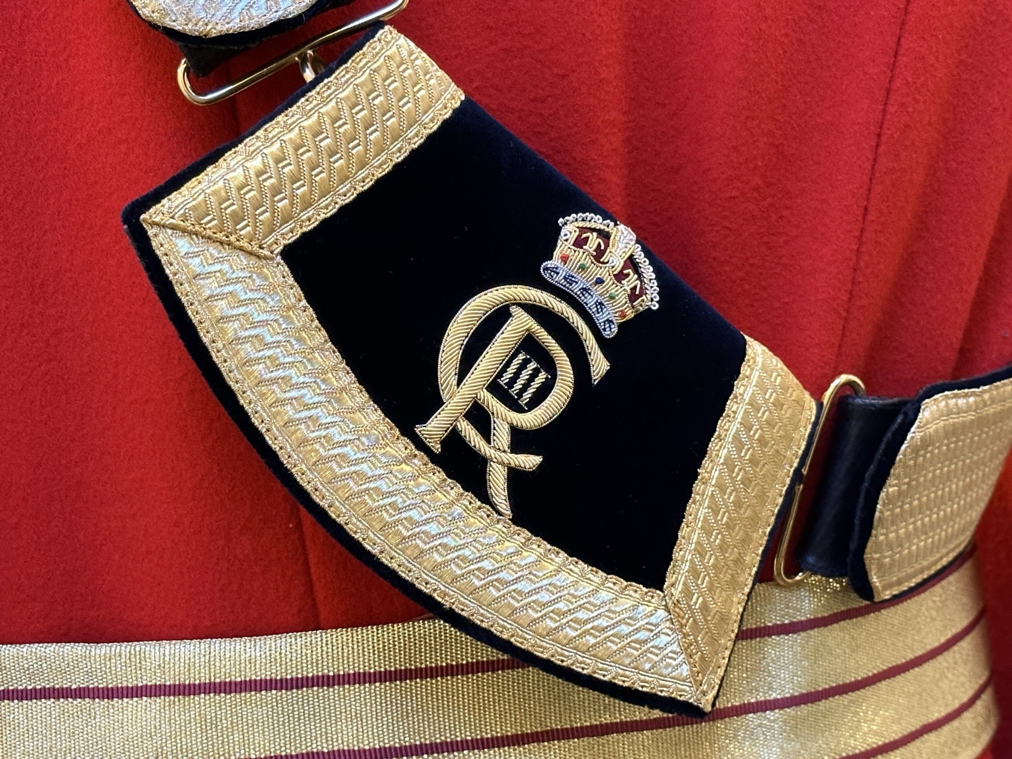 Pouch featuring the Royal Cipher of King Charles III. CRIII. CR3.  Gentlemen at Arms ceremonial uniform, the ceremonial bodyguard of King Charles III, which was founded by King Henry VIII in 1509. 13-May-2023.