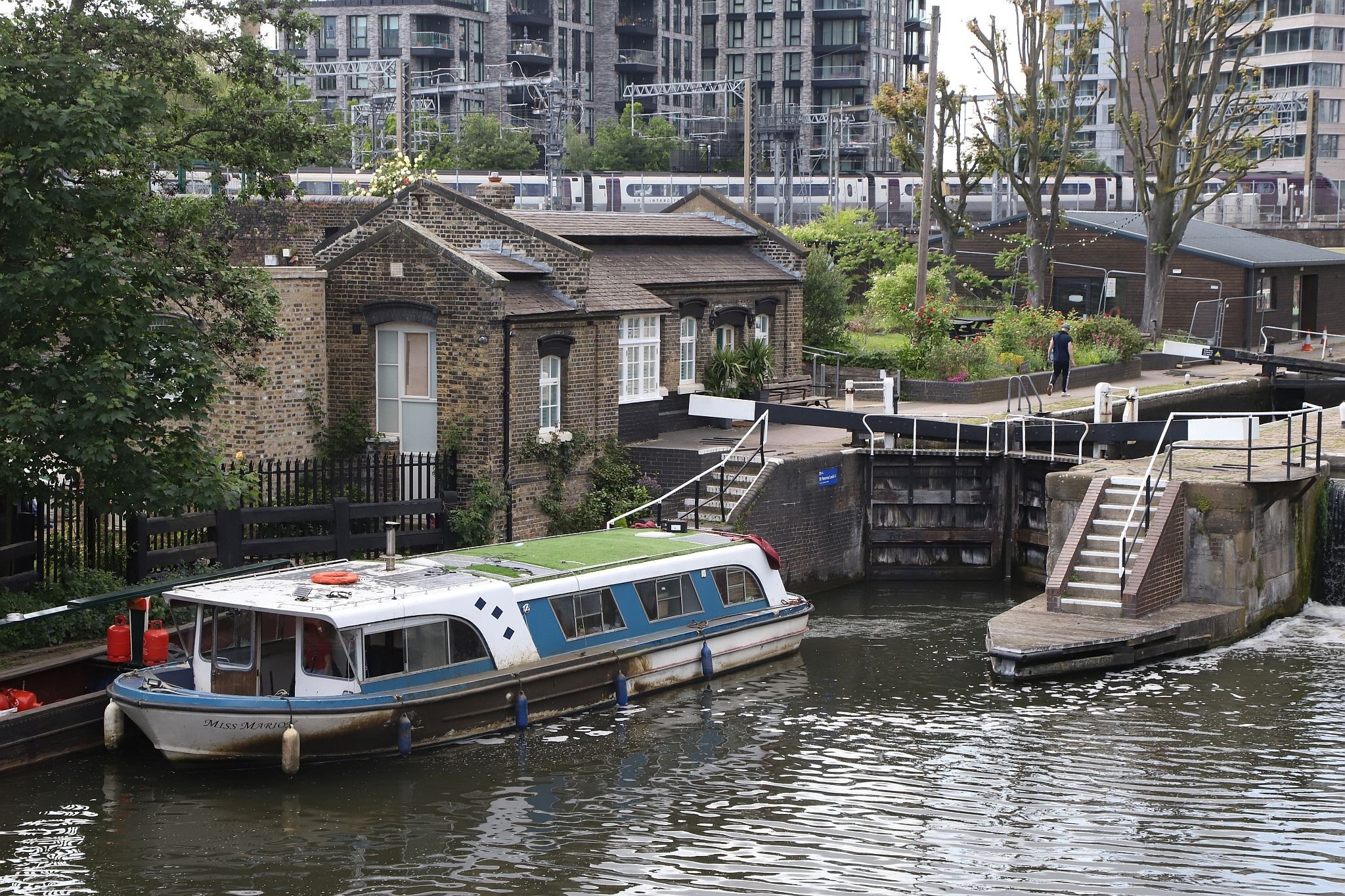 St Pancras Lock on the Regent's Canal next to the St Pancras waterpoint. Water tower. King's Cross. Coal Drops Yard. Regents Canal. 20-May-2023.