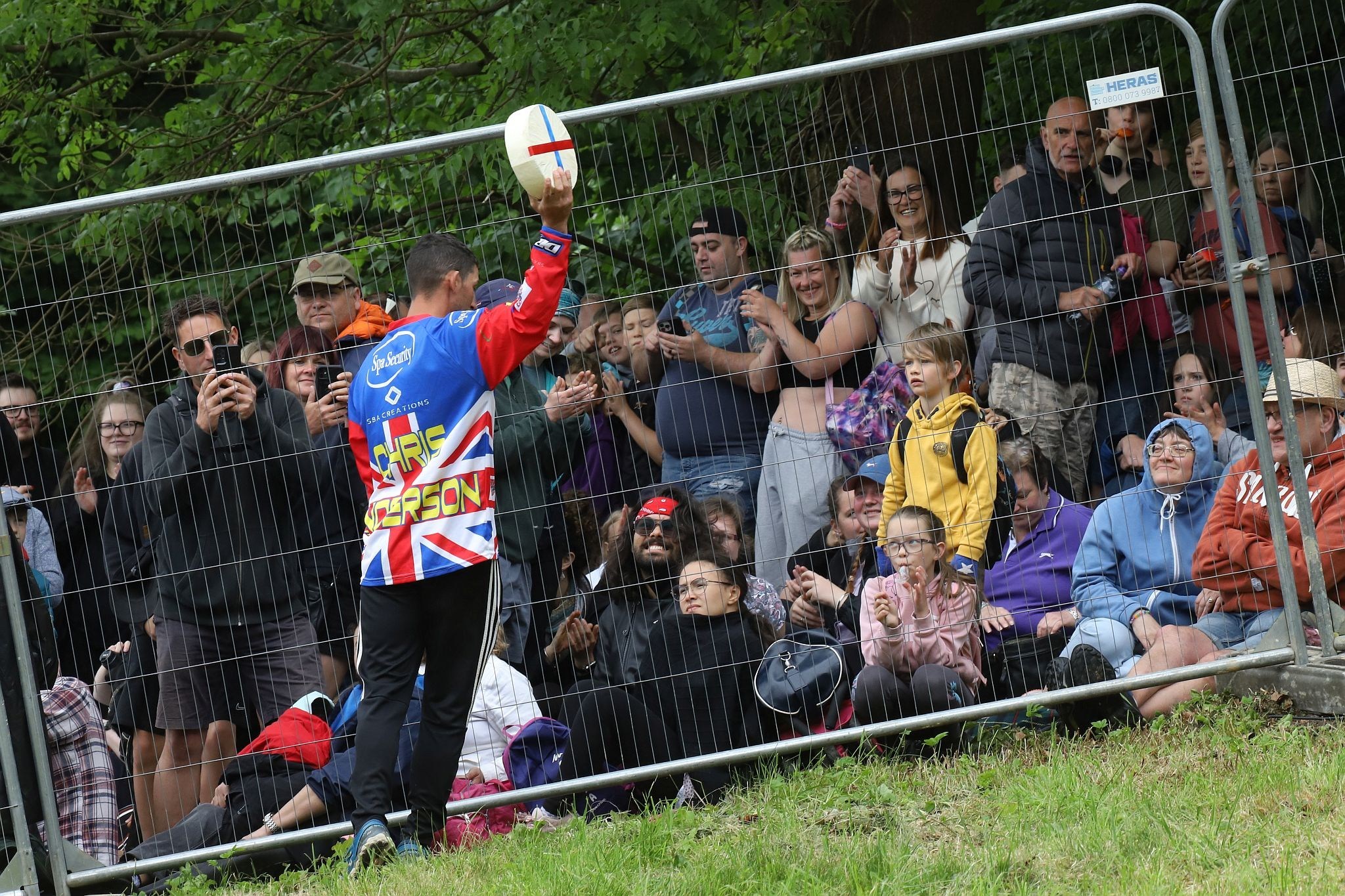 Chris Anderson, all time champion. Coopers Hill Cheese Rolling Race. 29-May-2023. Race downhill. Gloucestershire tradition.