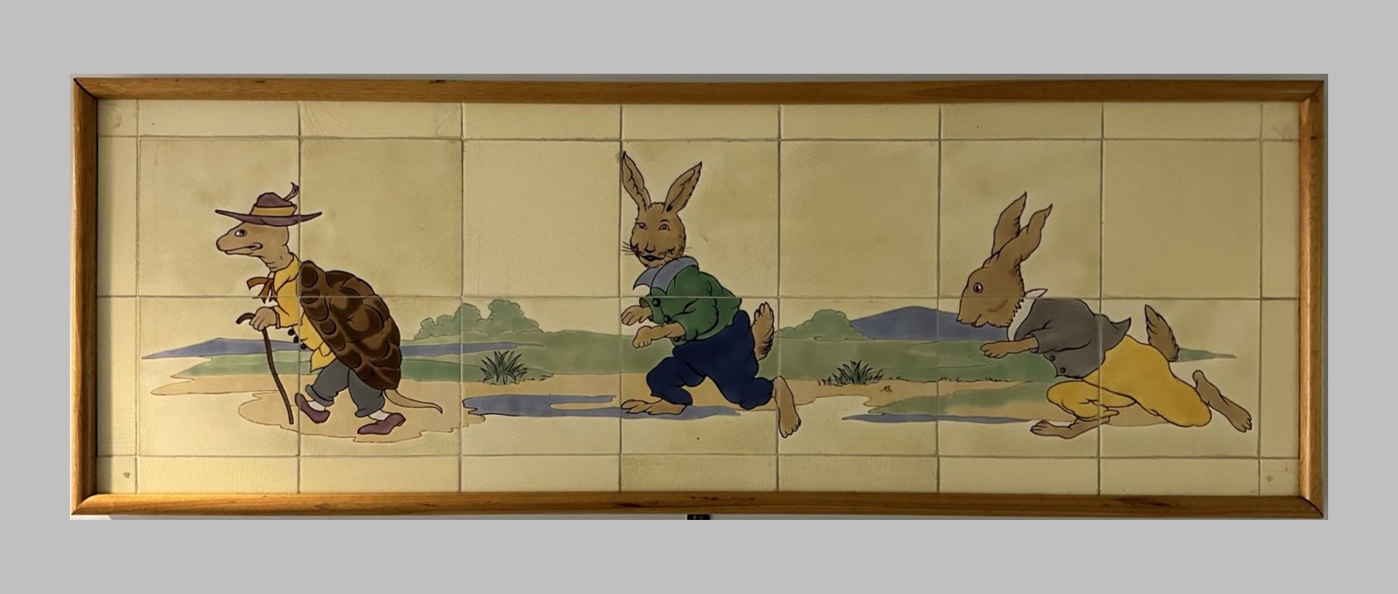 Animal scenes painted on Doulton tiles from the Evelina Children's Hospital displayed in a corridor of St Thomas' hospital.