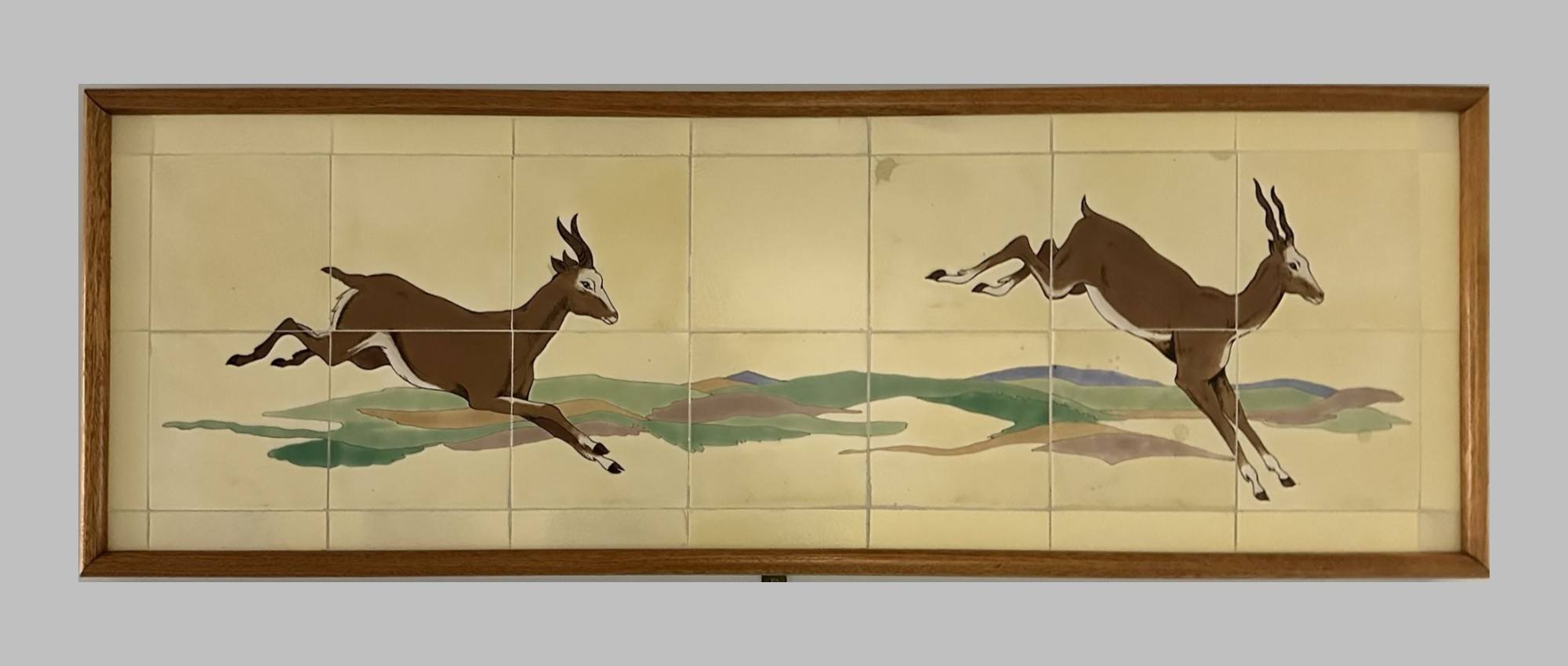Animal scenes painted on Doulton tiles from the Evelina Children's Hospital displayed in a corridor of St Thomas' hospital.