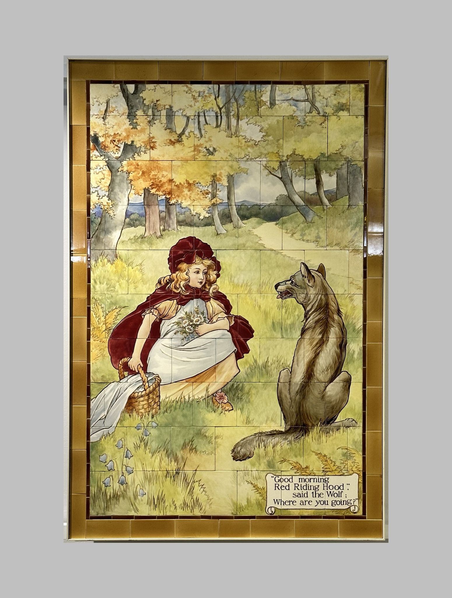 Little Red Riding Hood nursery rhyme fairy tale scene painted on Doulton tiles (commissioned around 1900) from the Evelina Children's Hospital displayed in the long corridor at St Thomas' hospital.