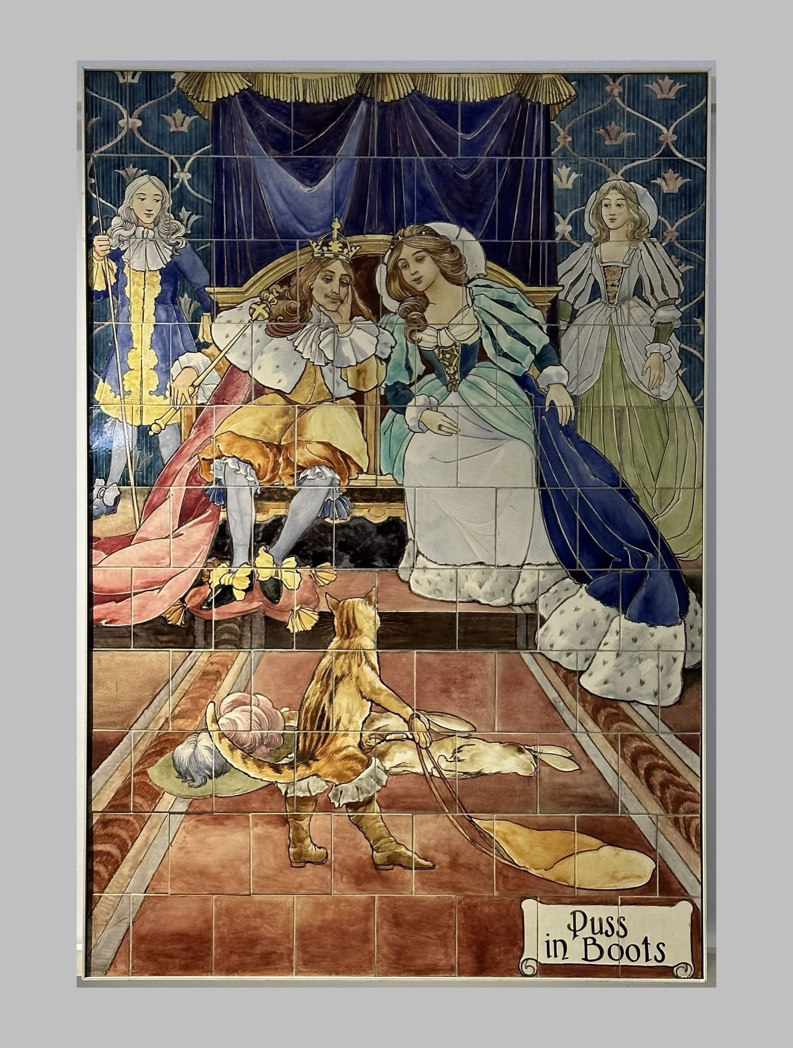 Puss In Boots nursery rhyme fairy tale scene painted on Doulton tiles (commissioned around 1900) from the Evelina Children's Hospital displayed in the long corridor at St Thomas' hospital.
