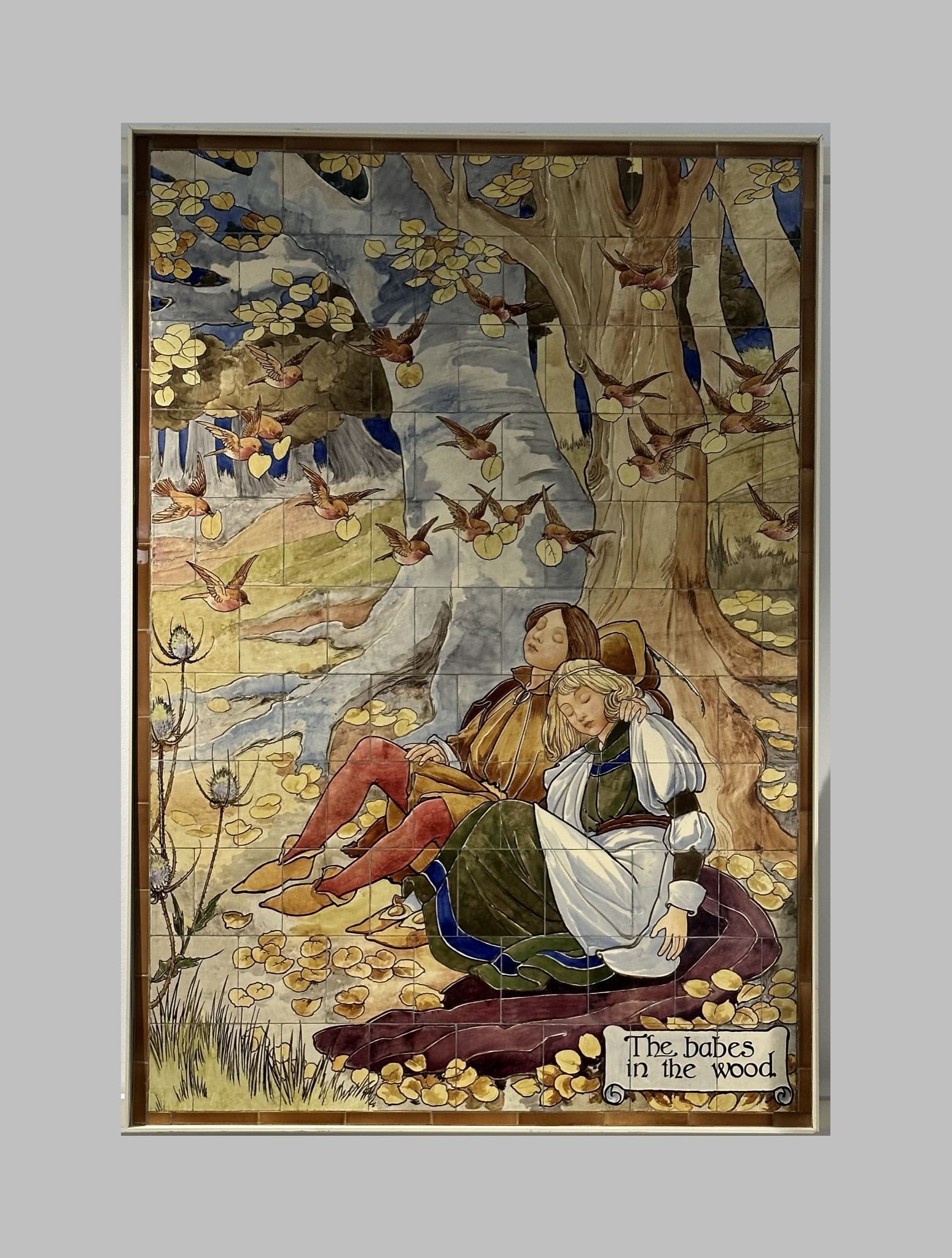 The Babes In The Wood scene painted on Doulton tiles (commissioned around 1900) from the Evelina Children's Hospital displayed in the long corridor at St Thomas' hospital.