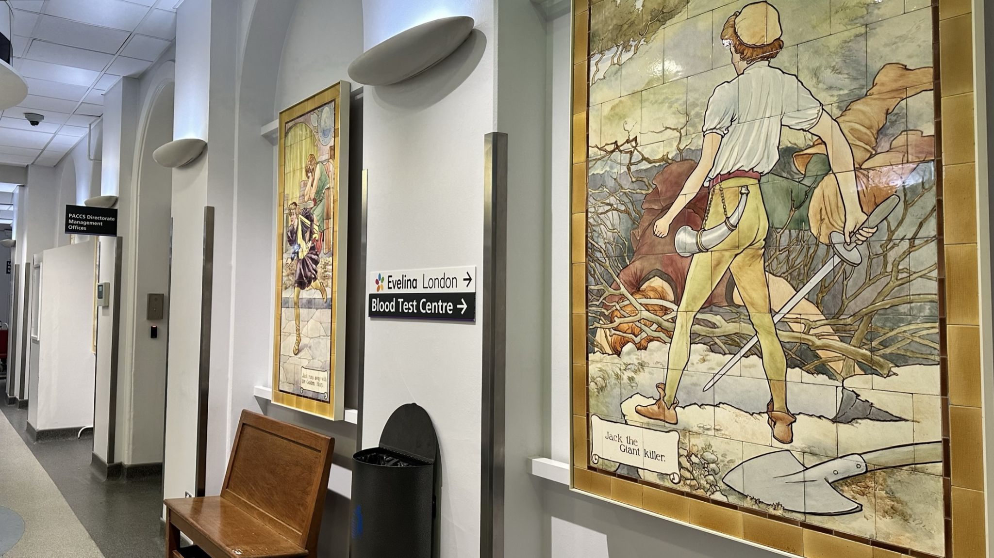 Nursery rhyme fairy tale scenes painted on Doulton tiles from the Evelina Children's Hospital displayed in the long corridor of St Thomas' hospital.