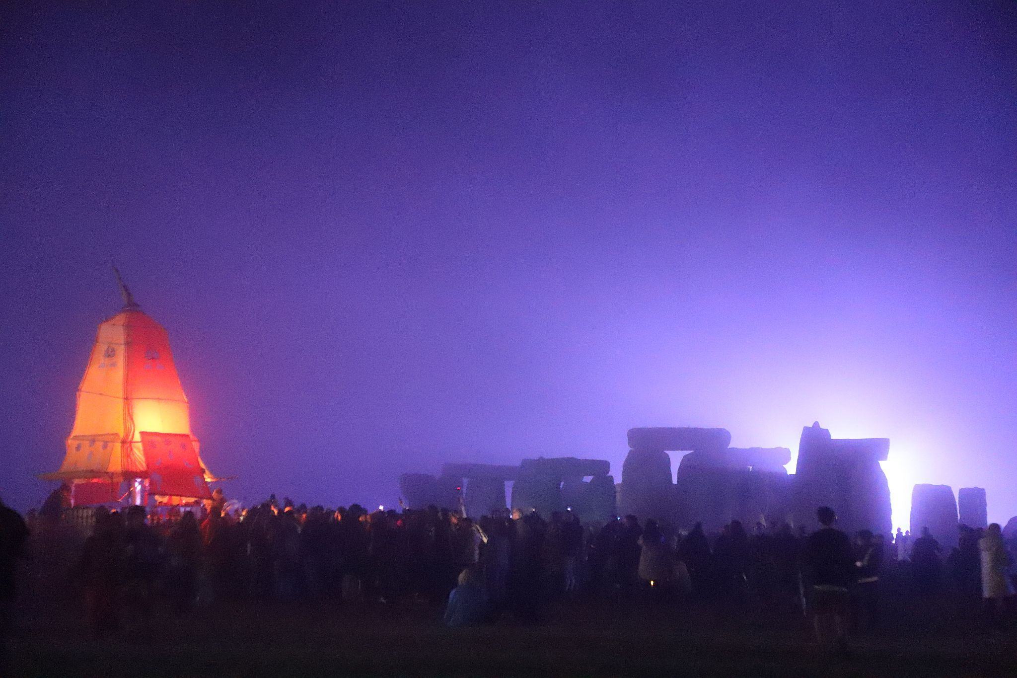 Stonehenge floodlit at night. The 2023 Summer Solstice longest day at Stonehenge in Wiltshire, UK. Photo taken 21-Jun-2023.