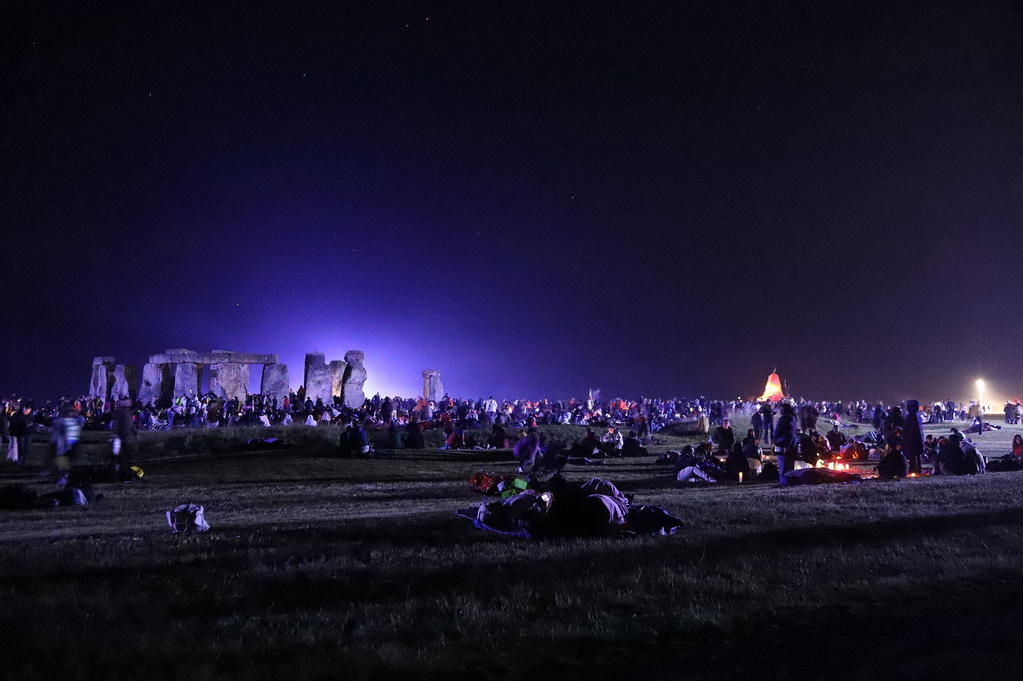 Stonehenge floodlit at night. The 2023 Summer Solstice longest day at Stonehenge in Wiltshire, UK. Photo taken 21-Jun-2023.