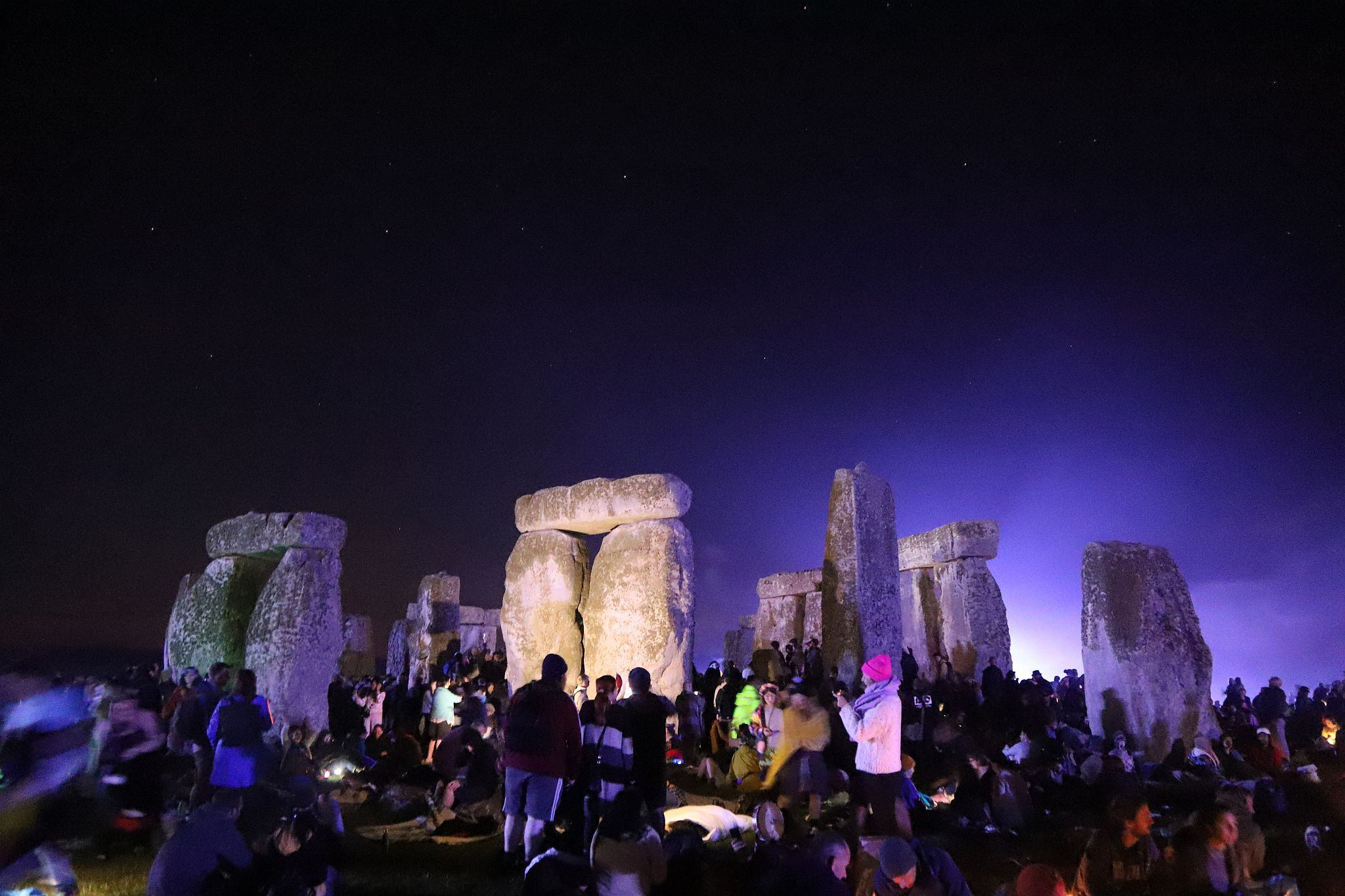 Stonehenge floodlit at night. The 2023 Summer Solstice longest day at Stonehenge in Wiltshire, UK. Photo taken 21-Jun-2023.