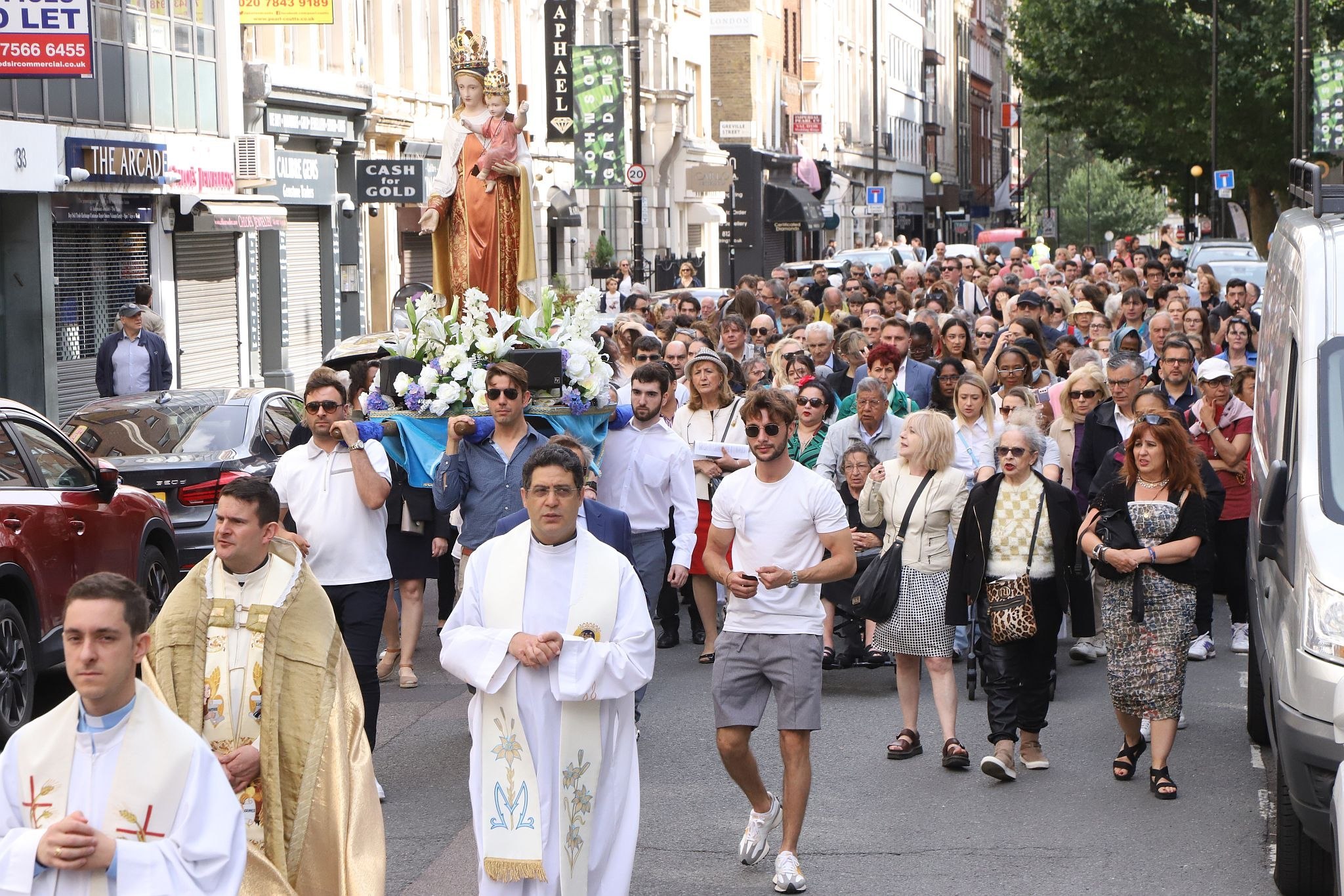 The 2023 annual Procession in Honour of Our Lady of Mount Carmel at St Peter's Italian Church in Clerkenwell, London. 16-Jul-2023.