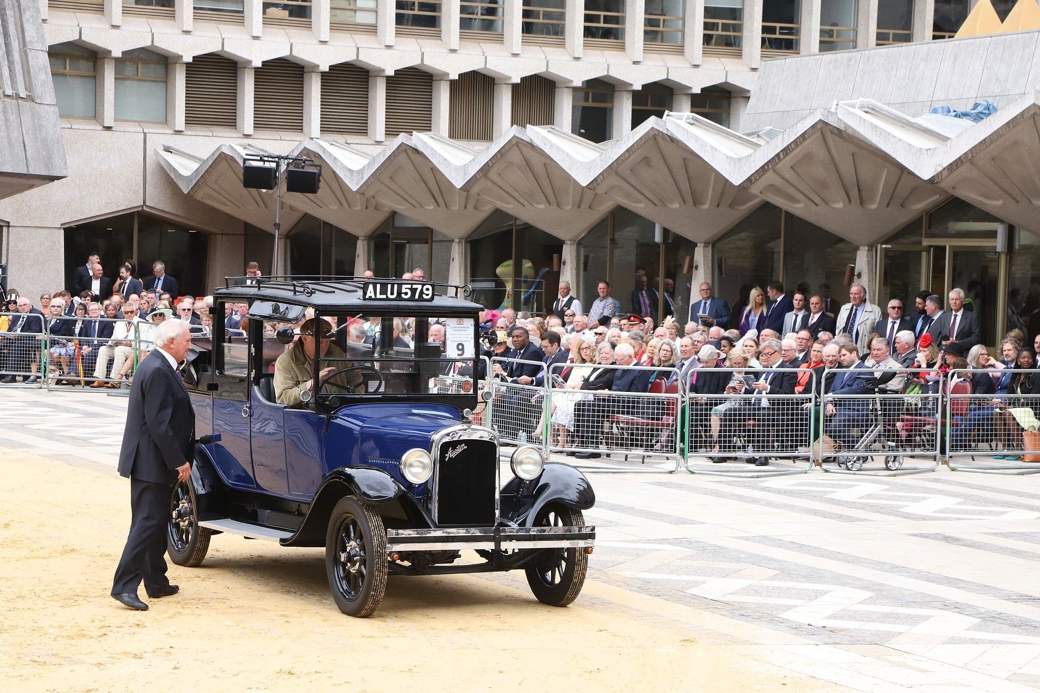 Austin Taxi 1923 ALU579. City of London 2023 Cart Marking in Guildhall Yard on 22-Jul-2023. Hosted by the Worshipful Company of Carmen with the Lord Mayor of the City of London in attendance. Wooden plates on the vehicles are branded with hot irons to allow them to ply for trade in the Square Mile. Another of the City Livery Company's annual ceremonies.