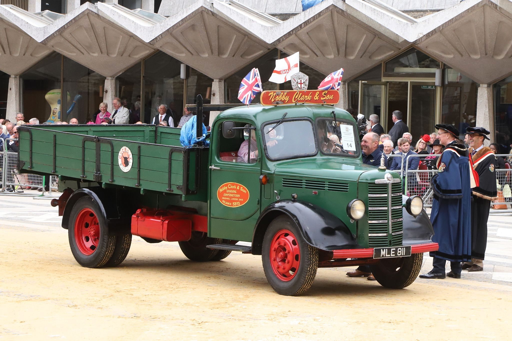 Bedford M Type 1953, MLE811. City of London 2023 Cart Marking in Guildhall Yard on 22-Jul-2023. Hosted by the Worshipful Company of Carmen with the Lord Mayor of the City of London in attendance. Wooden plates on the vehicles are branded with hot irons to allow them to ply for trade in the Square Mile. Another of the City Livery Company's annual ceremonies.