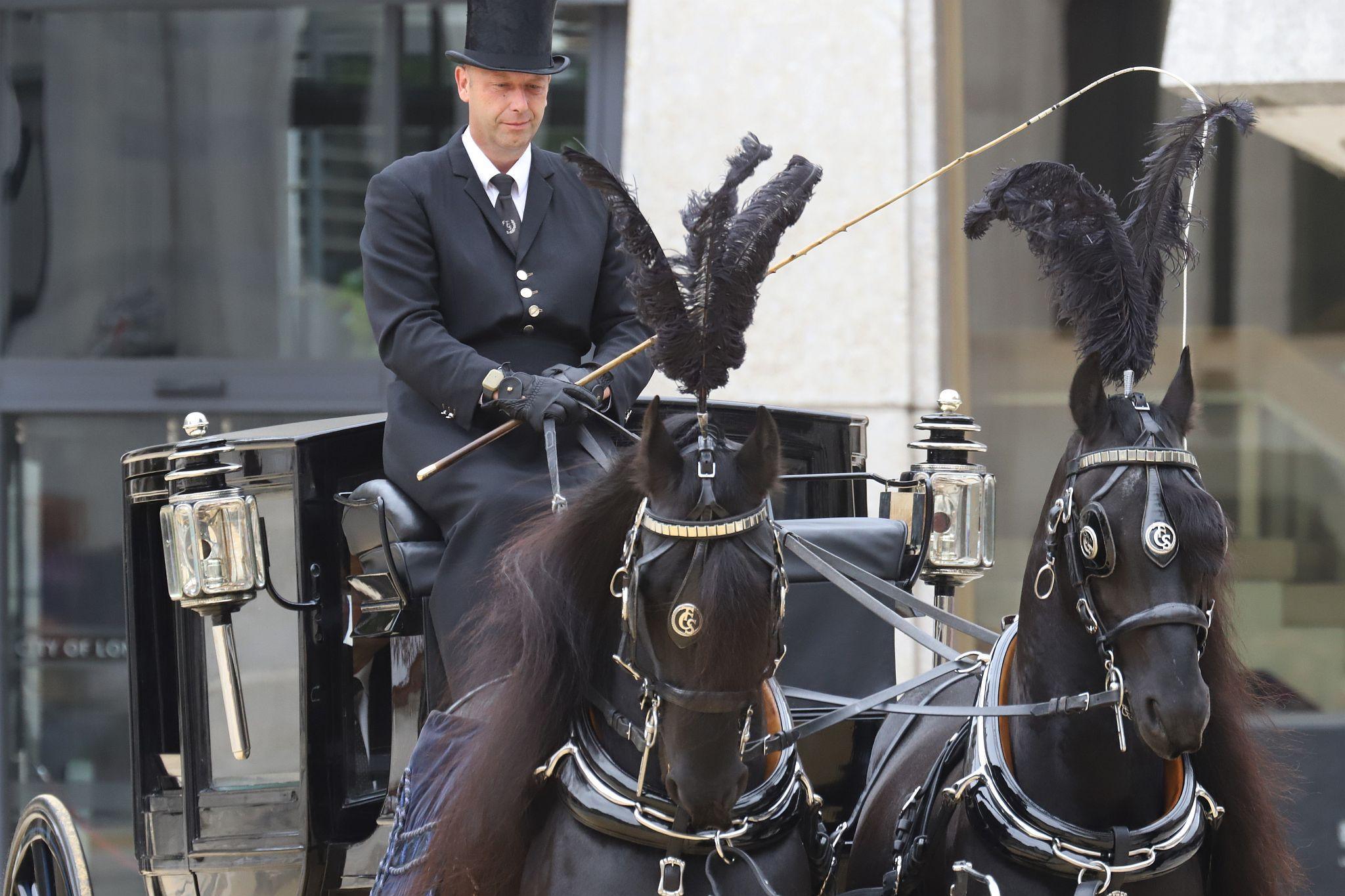 Horse Drawn Marsden Mourning Coach 1890. City of London 2023 Cart Marking in Guildhall Yard on 22-Jul-2023. Hosted by the Worshipful Company of Carmen with the Lord Mayor of the City of London in attendance. Wooden plates on the vehicles are branded with hot irons to allow them to ply for trade in the Square Mile. Another of the City Livery Company's annual ceremonies.