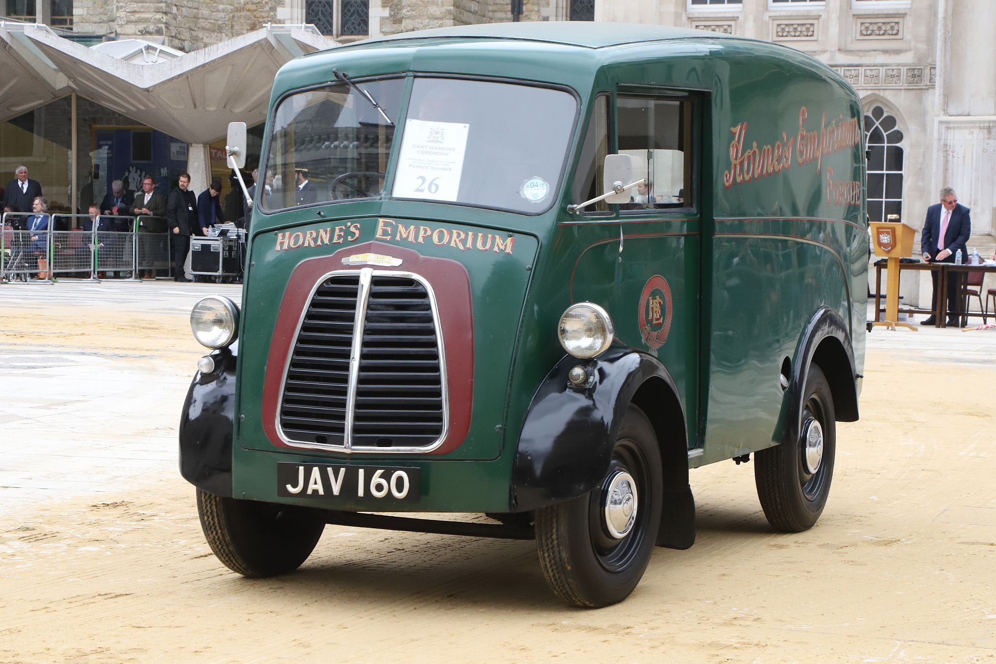 Morris J Type 1955 JAV160. City of London 2023 Cart Marking in Guildhall Yard on 22-Jul-2023. Hosted by the Worshipful Company of Carmen with the Lord Mayor of the City of London in attendance. Wooden plates on the vehicles are branded with hot irons to allow them to ply for trade in the Square Mile. Another of the City Livery Company's annual ceremonies.