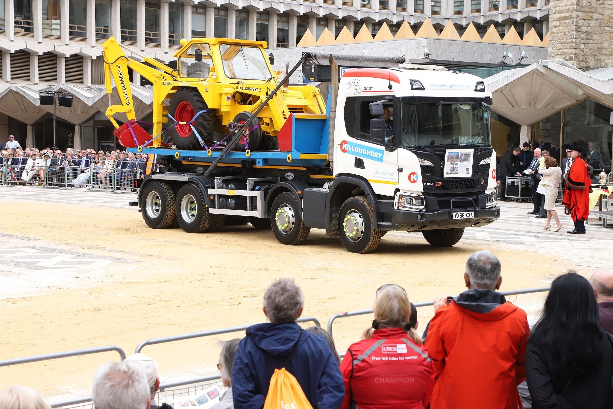 Scania VX68XXA. City of London 2023 Cart Marking in Guildhall Yard on 22-Jul-2023. Hosted by the Worshipful Company of Carmen with the Lord Mayor of the City of London in attendance. Wooden plates on the vehicles are branded with hot irons to allow them to ply for trade in the Square Mile. Another of the City Livery Company's annual ceremonies.